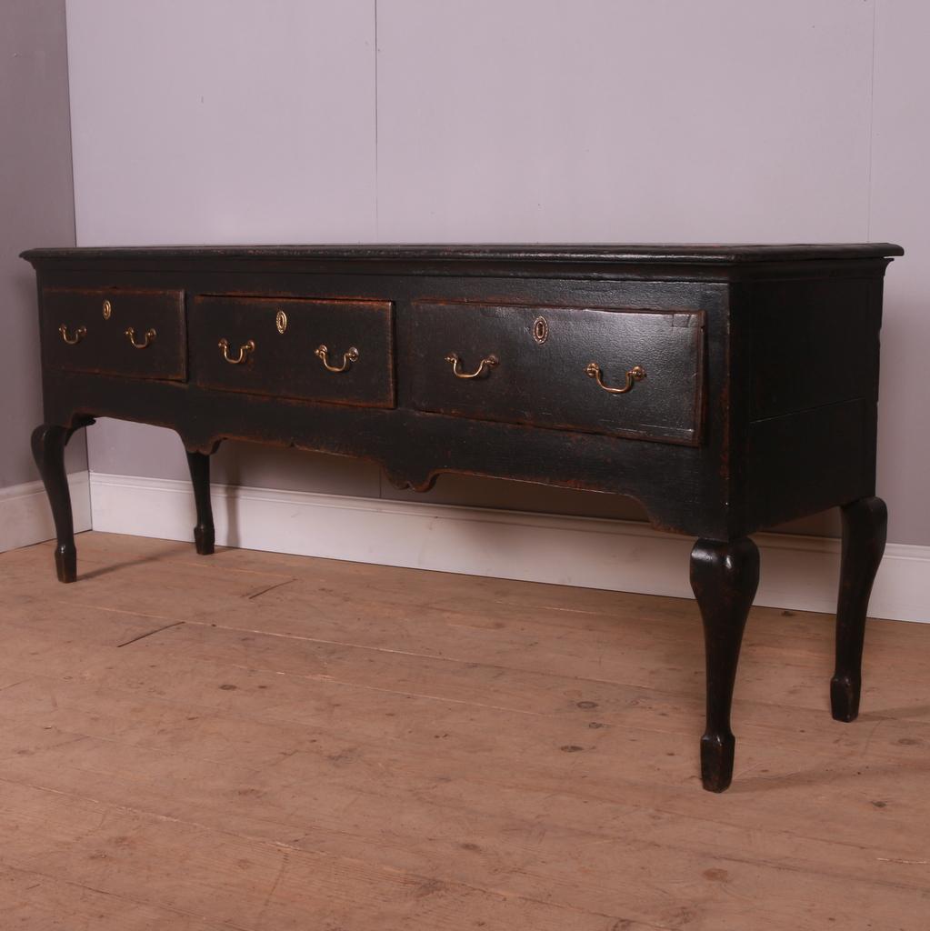 Large 18th C painted 3 drawer dresser base with unusual spade foot and cabriole leg. 1790.

Dimensions
80.5 inches (204 cms) Wide
19.5 inches (50 cms) Deep
32.5 inches (83 cms) High.