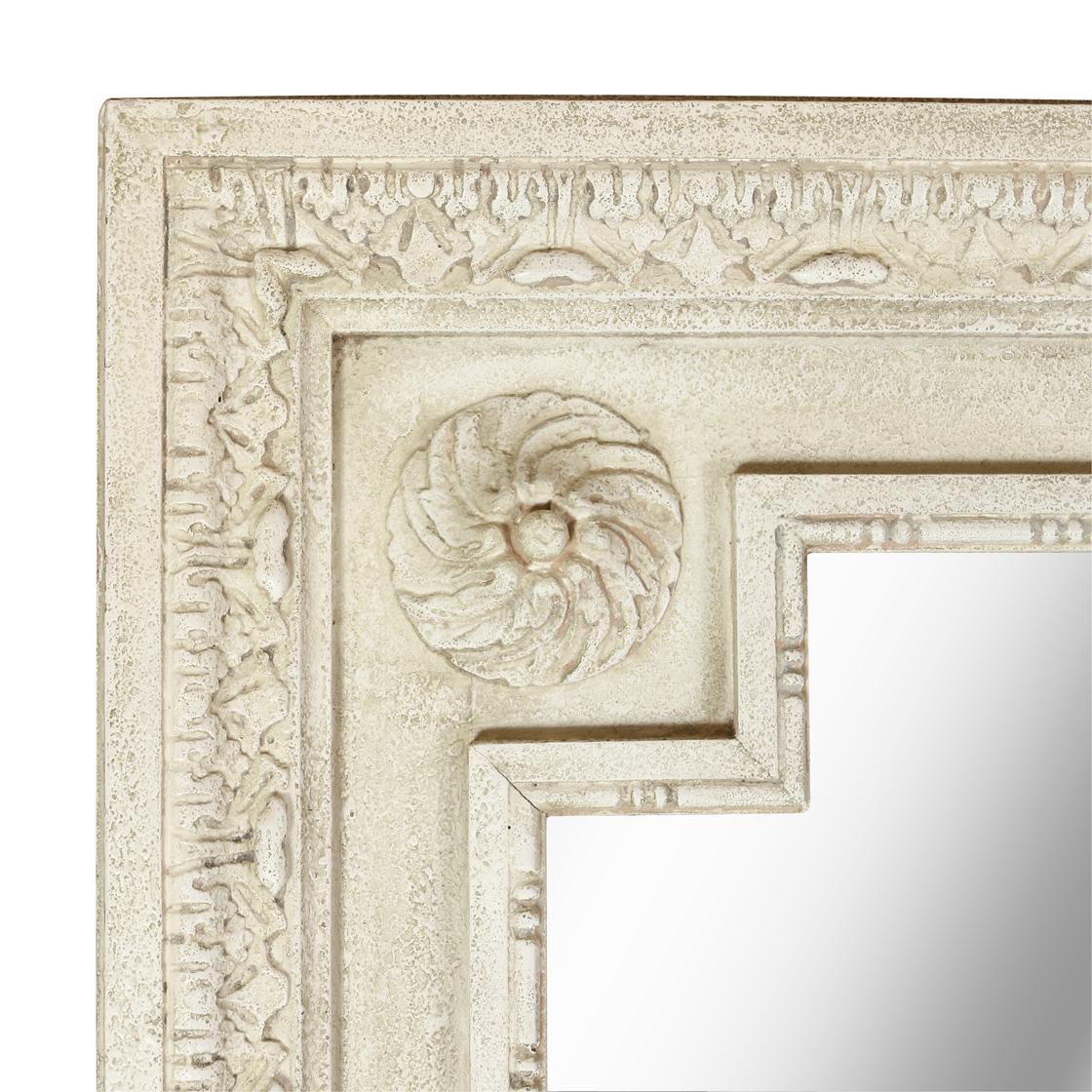 A large cream painted French carved neoclassical pier mirror with carved acanthus leaves and medallions at each mirror corner.