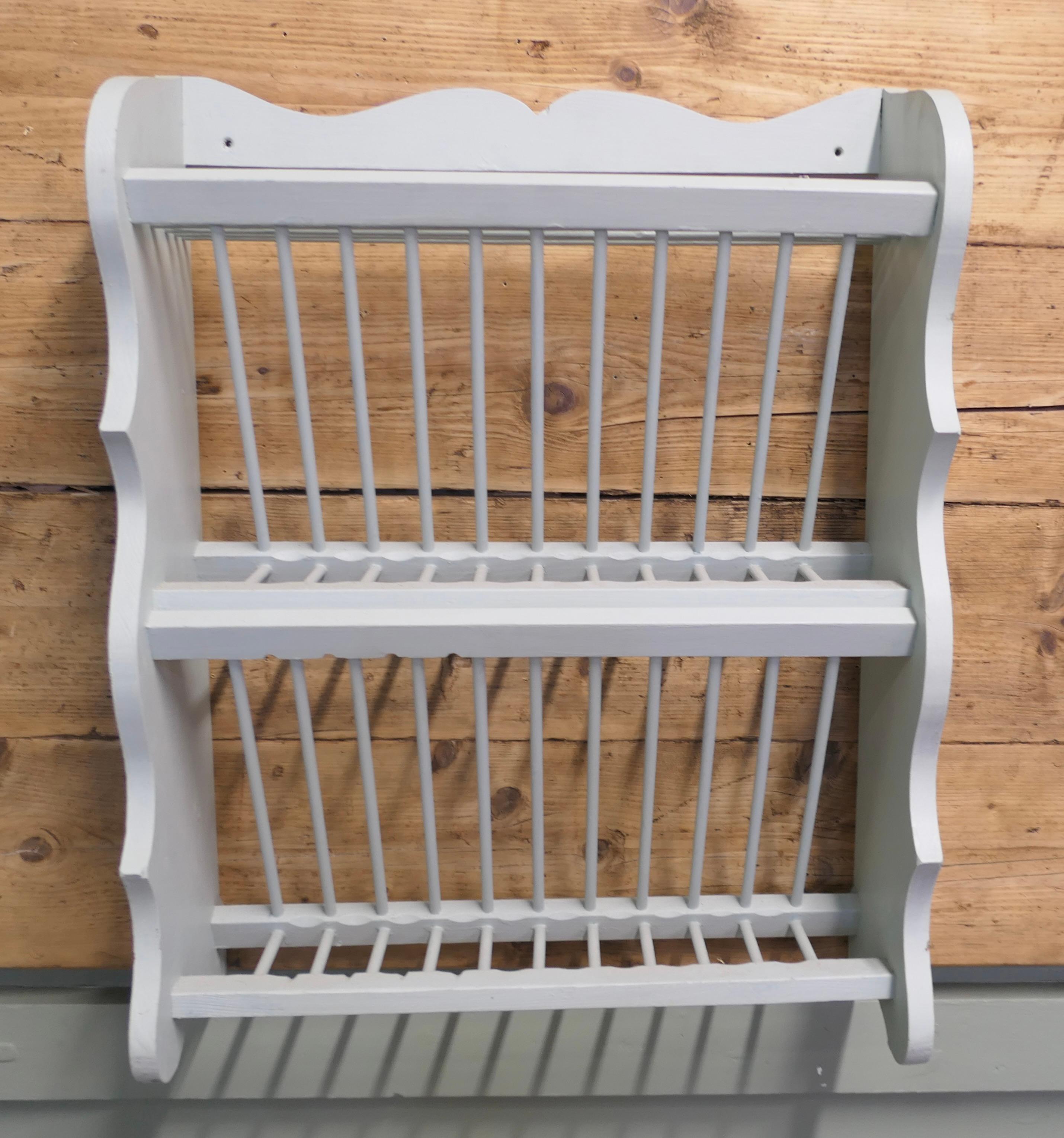 Mid-20th Century Large Painted Wall Hanging Pine Plate Rack  This useful piece hangs on the wall For Sale