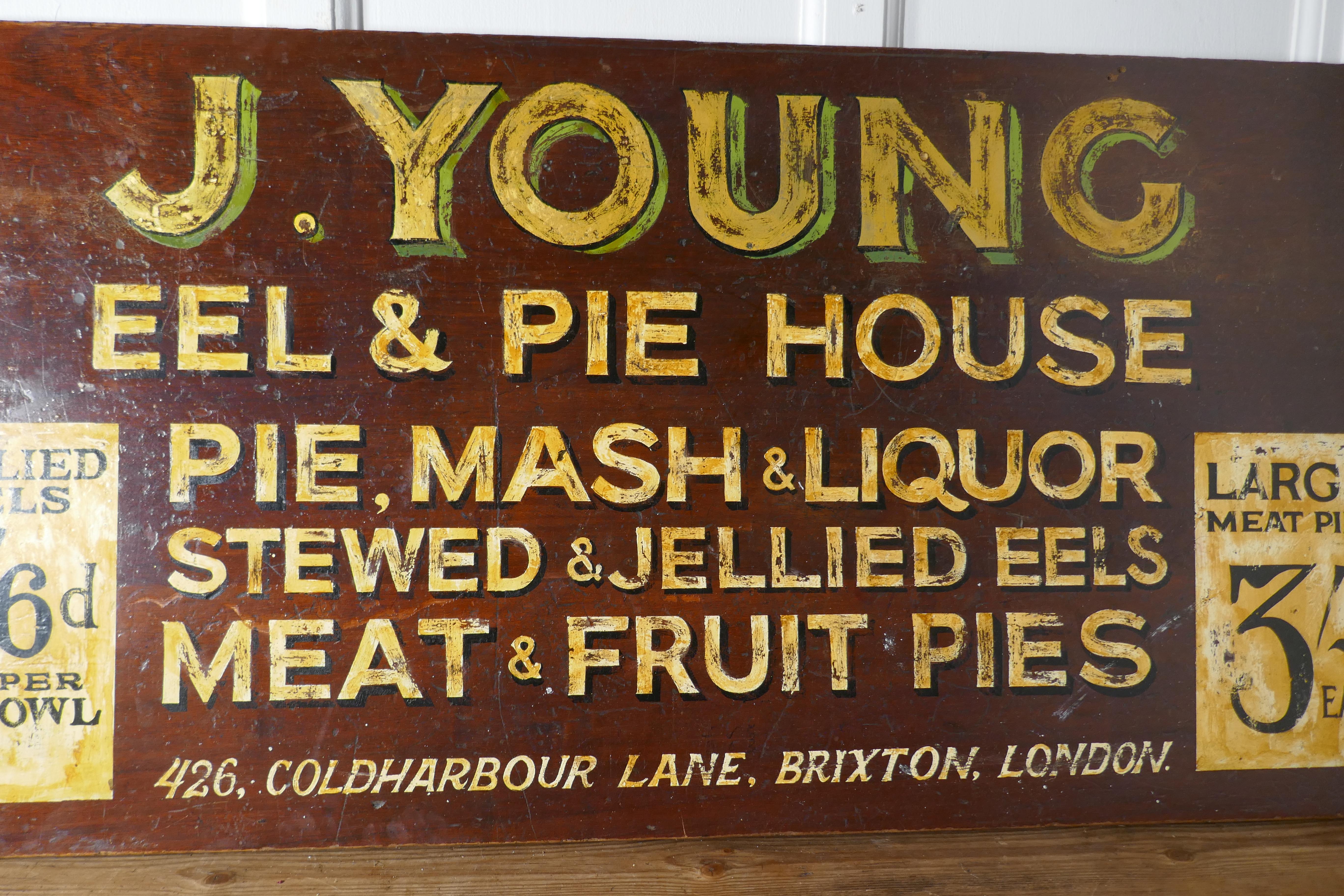 Large painted wooden advertising sign, Youngs London Eel and Pie Shop

A great piece and historic interest, the paint has a crackly but still sound finish, the sign is a heavy piece, Eel and Pie shops were very common in the early 20th century
