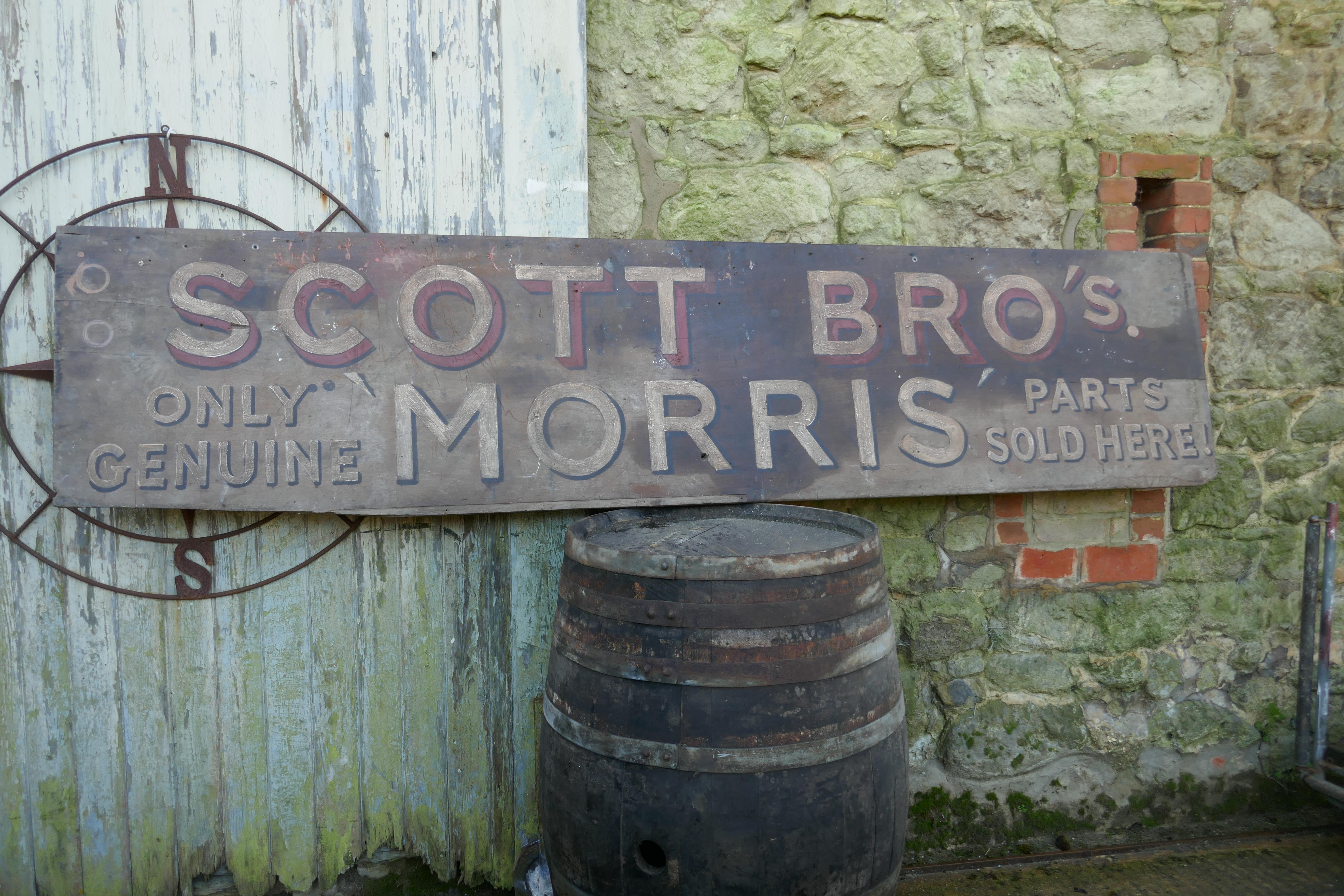 Large painted wooden automobile advertising sign, “Scott Bro’s Morris”

This is a large painted wooden wall sign 
Shabby now but quite readable
It is 25” high and 108” wide 
TGB421.