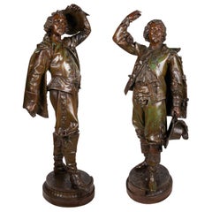 Grande coppia di cavalieri in spelta bronzata del XIX secolo