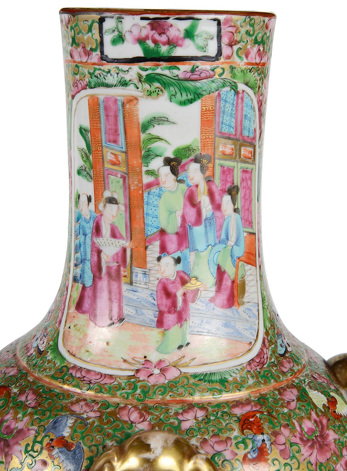 A very good quality pair of 19th century Chinese Rose medallion vases / lamps. Each with wonderful bold classical Cantonese birds, flower, butterflies in Green, white and pink, inset hand painted panels depicting exotic birds and scenes of various