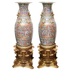Large pair 19th Century Rose medallion vases on stands.