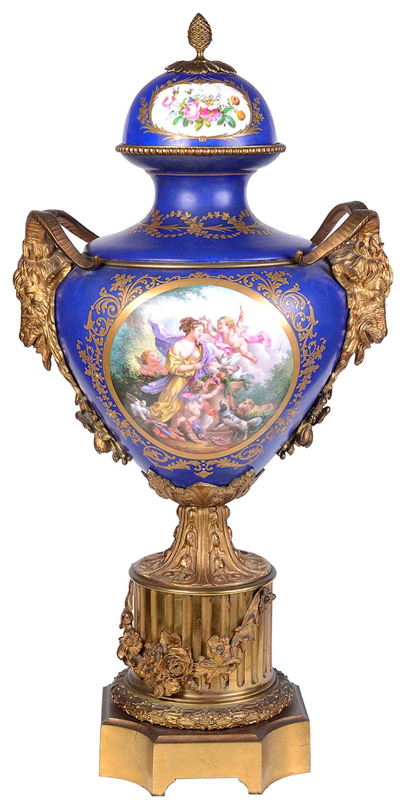 A very impressive pair of 19th century French 'Sevres' style gilded ormolu lidded vases, 82cm(32