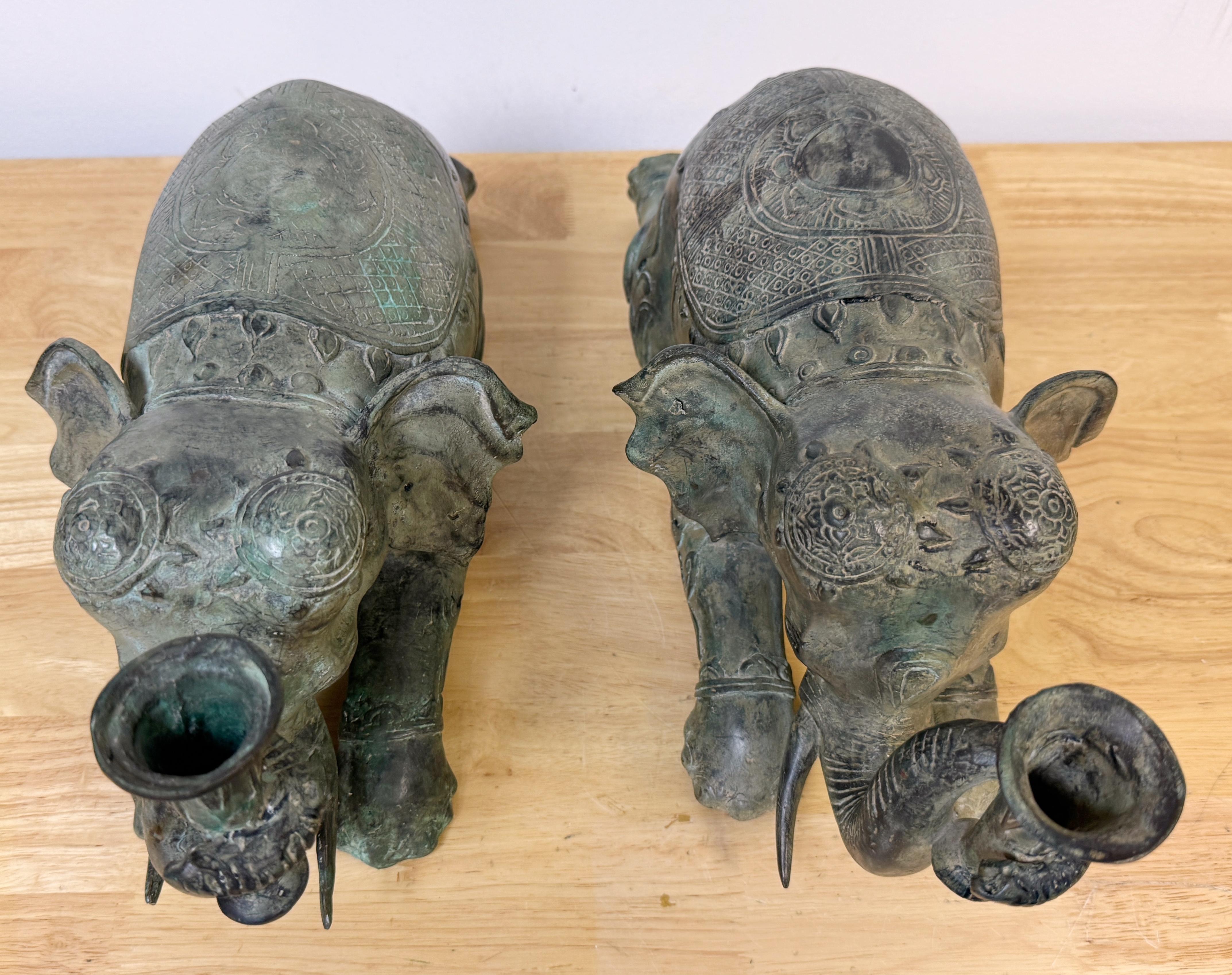 20th Century Large Pair Asian Bronze Recumbent Processional Elephant Motif Candlesticks For Sale