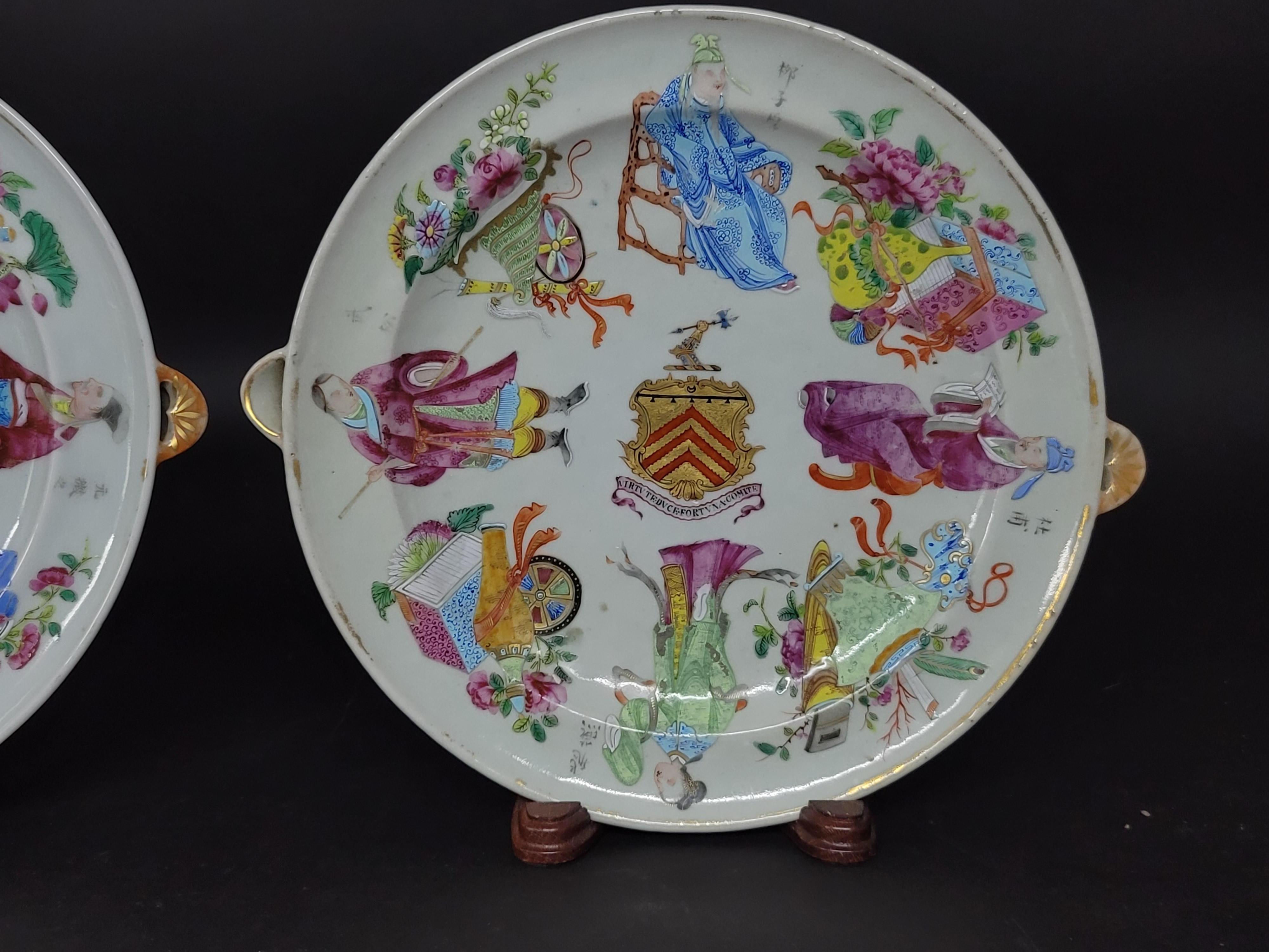 Early 19th century. Warming plates with water reservoir and historical figures and family crest in the center of the plate. The Arms of 