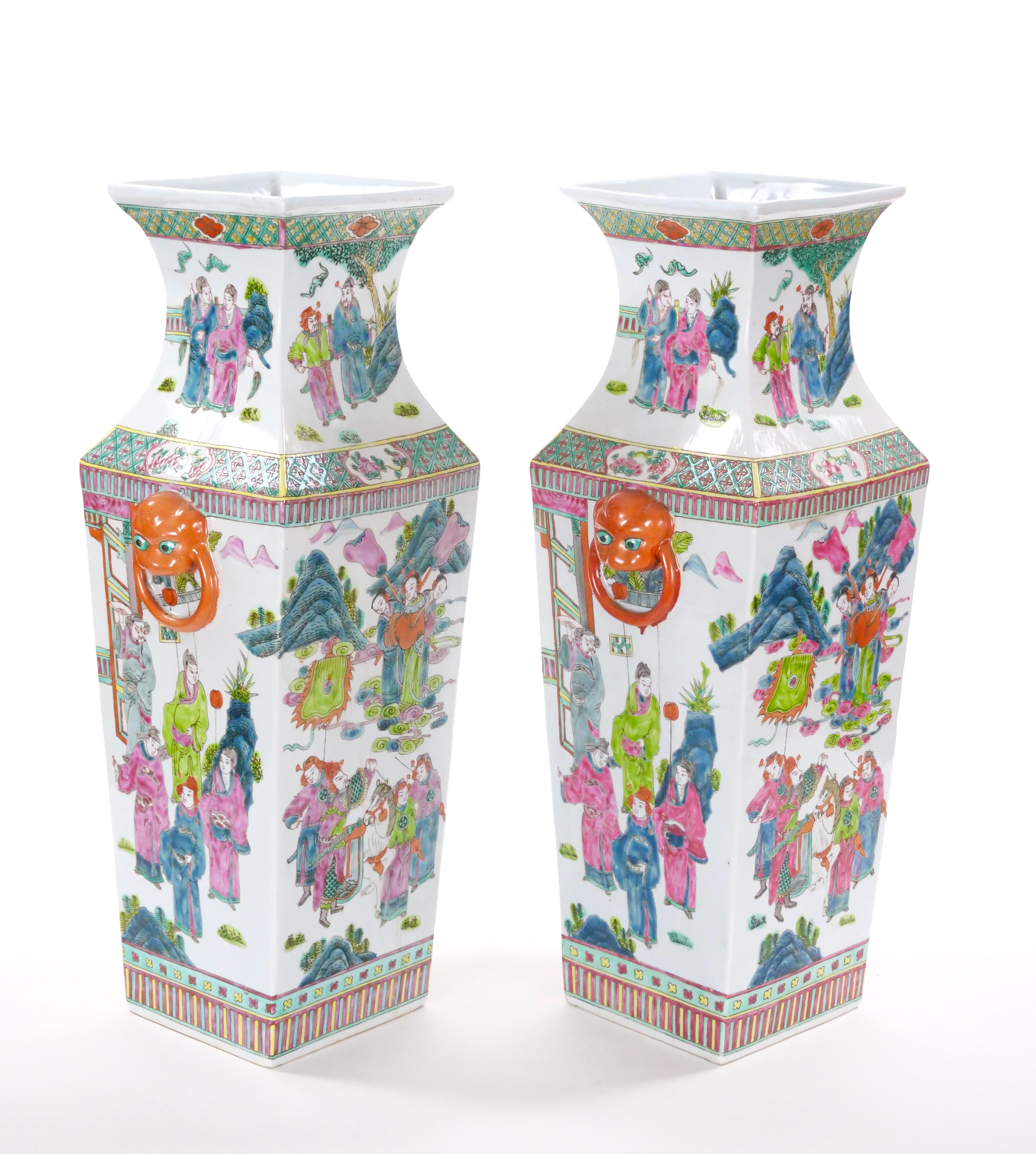 Immerse yourself in the timeless beauty of these large porcelain Famille Rose vases, crafted in China in the early 1900s. Each vase serves as a canvas for intricate and traditional Chinese depictions, exemplifying the rich artistic heritage of the
