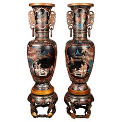Large pair Chinoiserie lacquer vases on stands, circa 1900.