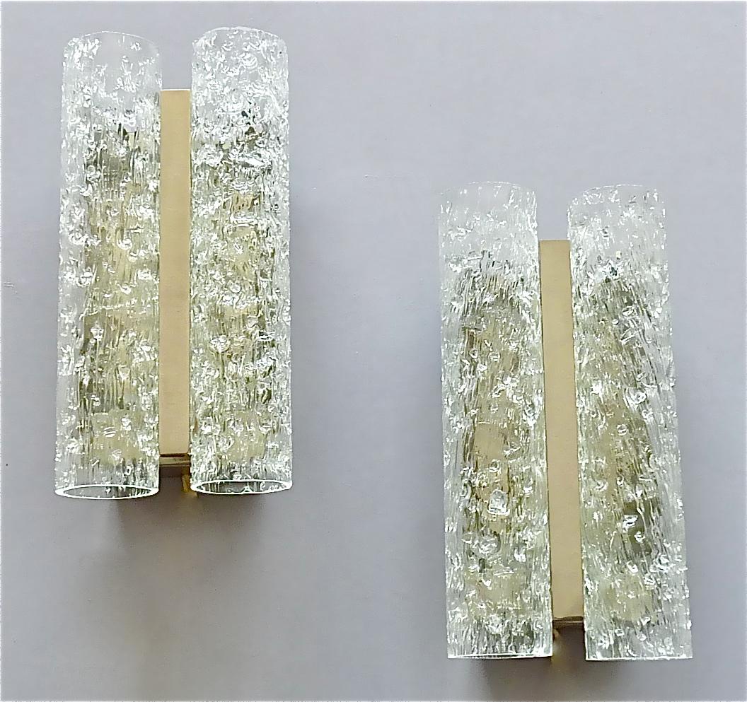 Large pair Murano textured ice glass tube sconces or wall lights by Doria, Germany around 1960s. The frames of these modernist and stylish lamps are made of matt nickeled or chromed brass metal. They have white plastic fittings and they take each