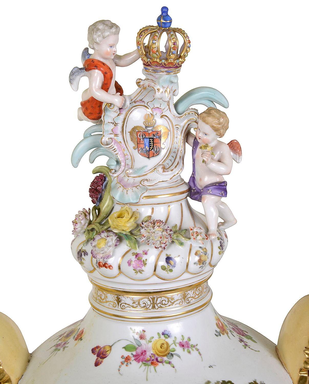 An impressive pair Dresden, Meissen style German porcelain lidded vases. Each with Cherubs frolicking around, depicting classical hand painted scene, floral swags, gilded mask handles.



Batch 82 54573. TBSYN