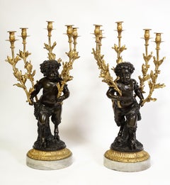 Large Pair French Patinated & Dore Bronze Putti Form Candelabra on Marble Bases