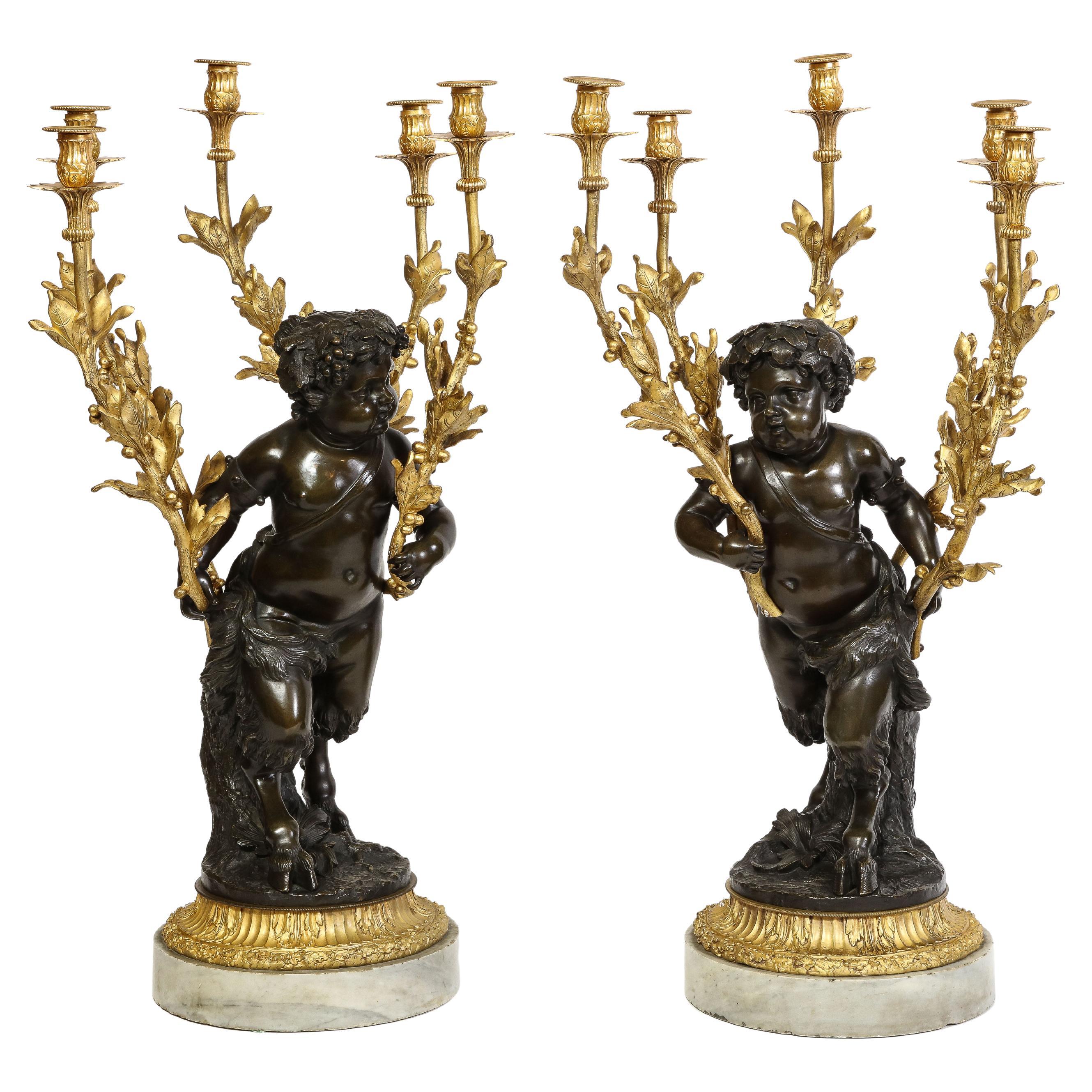 Large Pair French Patinated & Dore Bronze Putti Form Candelabra on Marble Bases For Sale