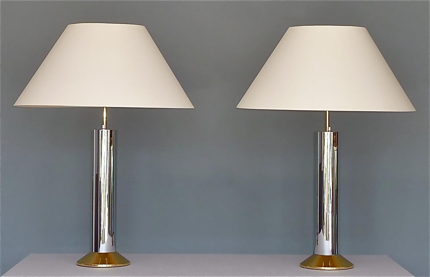 Fantastic large and high quality pair Italian table lamps in chromed brass and gilt metal, Italy around 1970s. Very in the style of Romeo Rega, Willy Rizzo and Gabriella Crespi the beautiful table lamps take each four E27 standard screw bulbs to