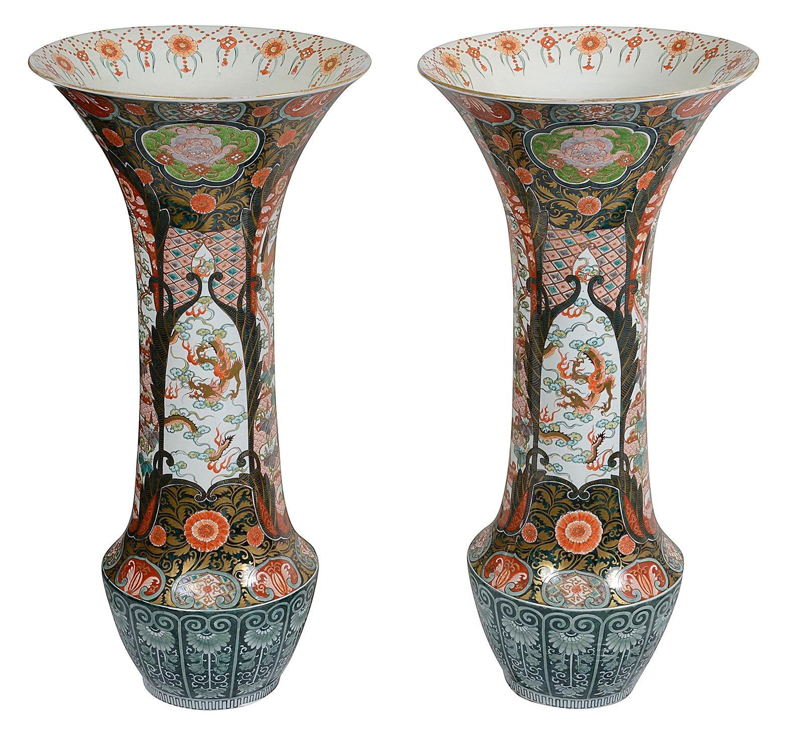 A spectacular pair of large 19th Century Japanese Imari spill vases, each with classical motif decoration, top and bottom. Inset hand painted scenes depicting exotic birds, flowers and foliage.



Batch 83 62013. SNYKZ