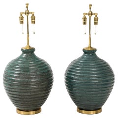Large Pair of  1970's Ribbed Pottery Lamps With A Teal Green Glaze