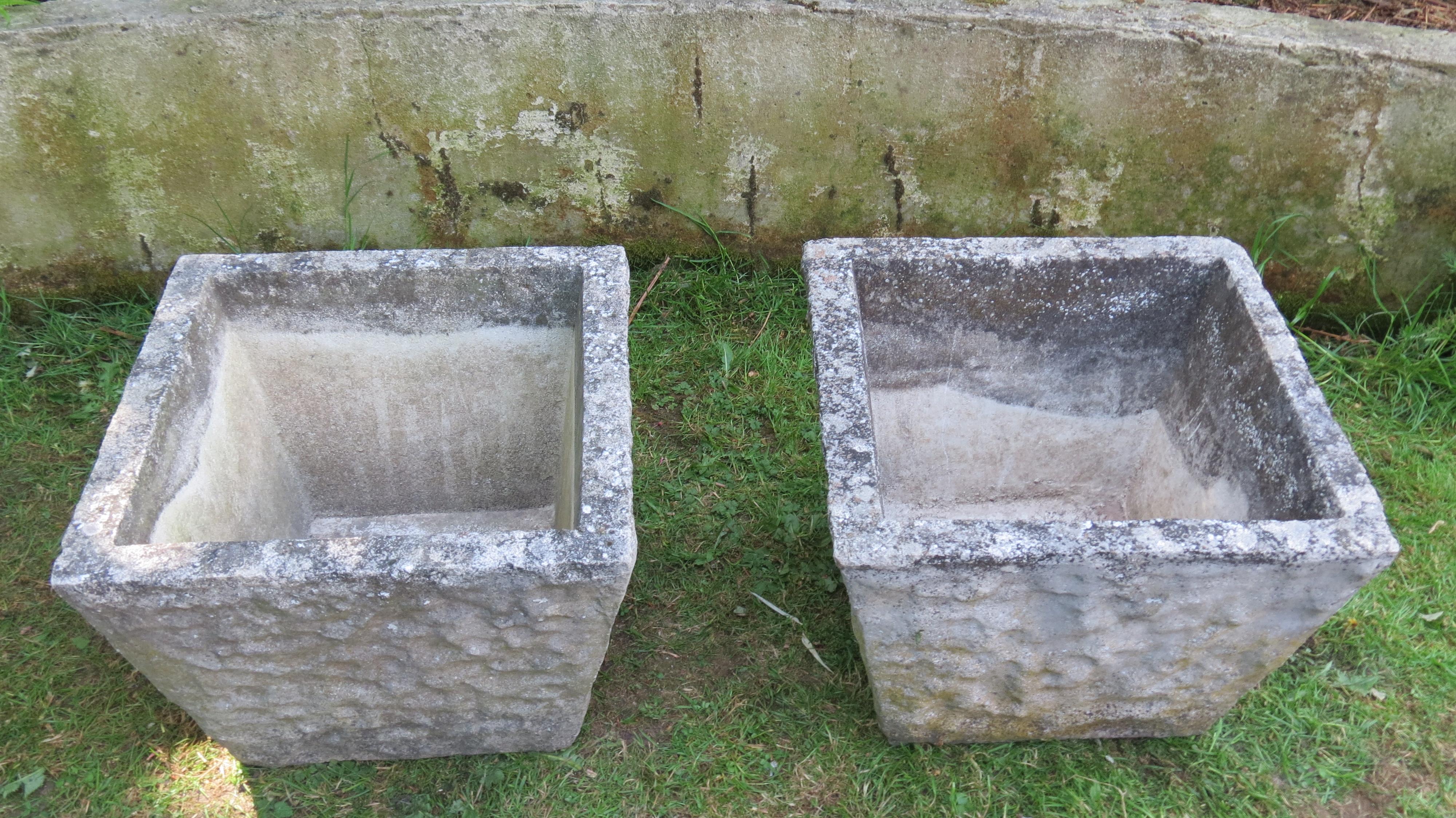 A very good quality pair of square concrete planters from the 1970s. Made from solid concrete with textured finish to all four sides of each planter.

Good vintage condition, nicely patinated.

ST1202.