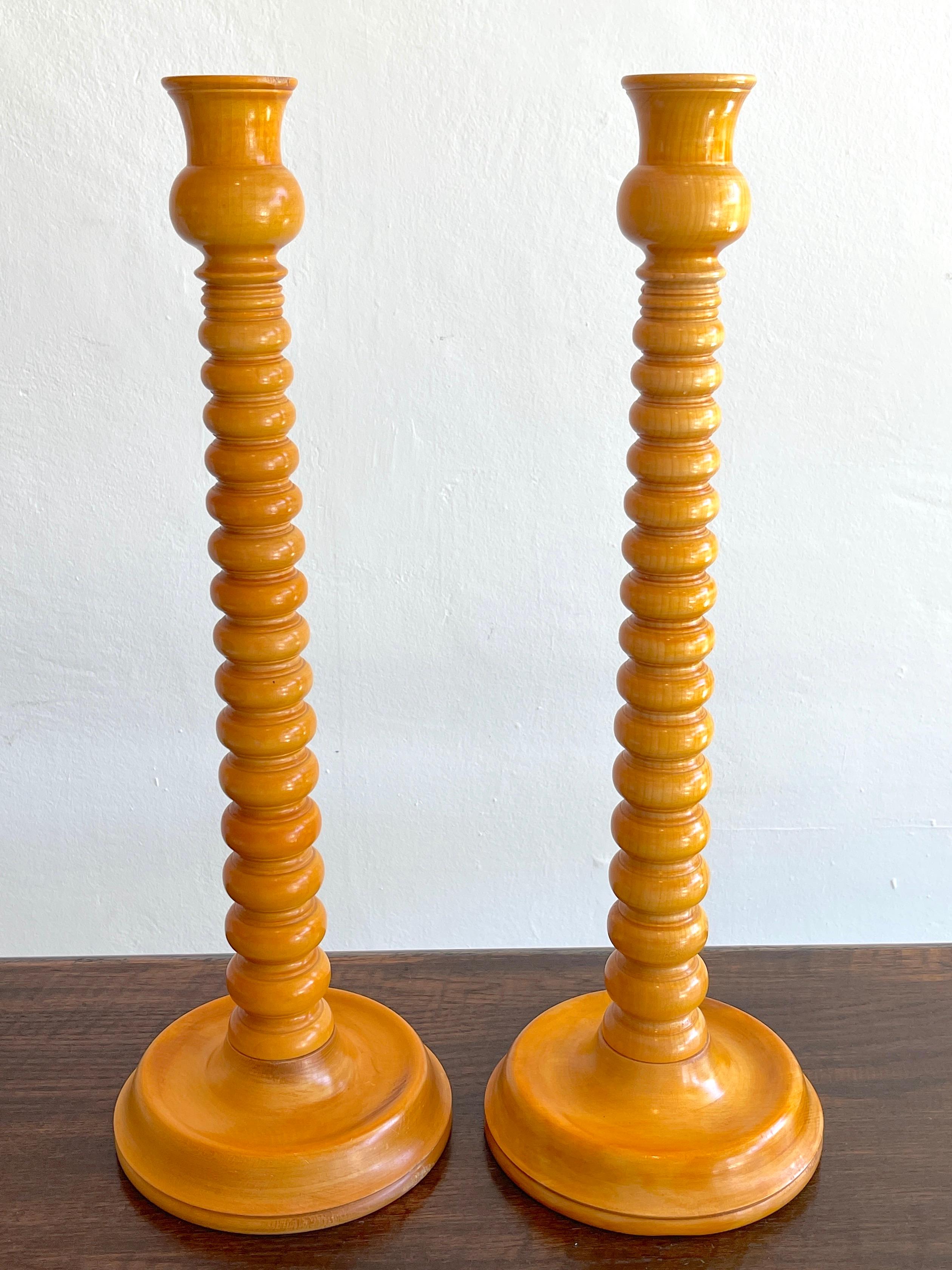 Large Pair of 19th C English Elm Wood Barley Twist Candlesticks, Each one of book-matched carved Elm wood standing 23.5