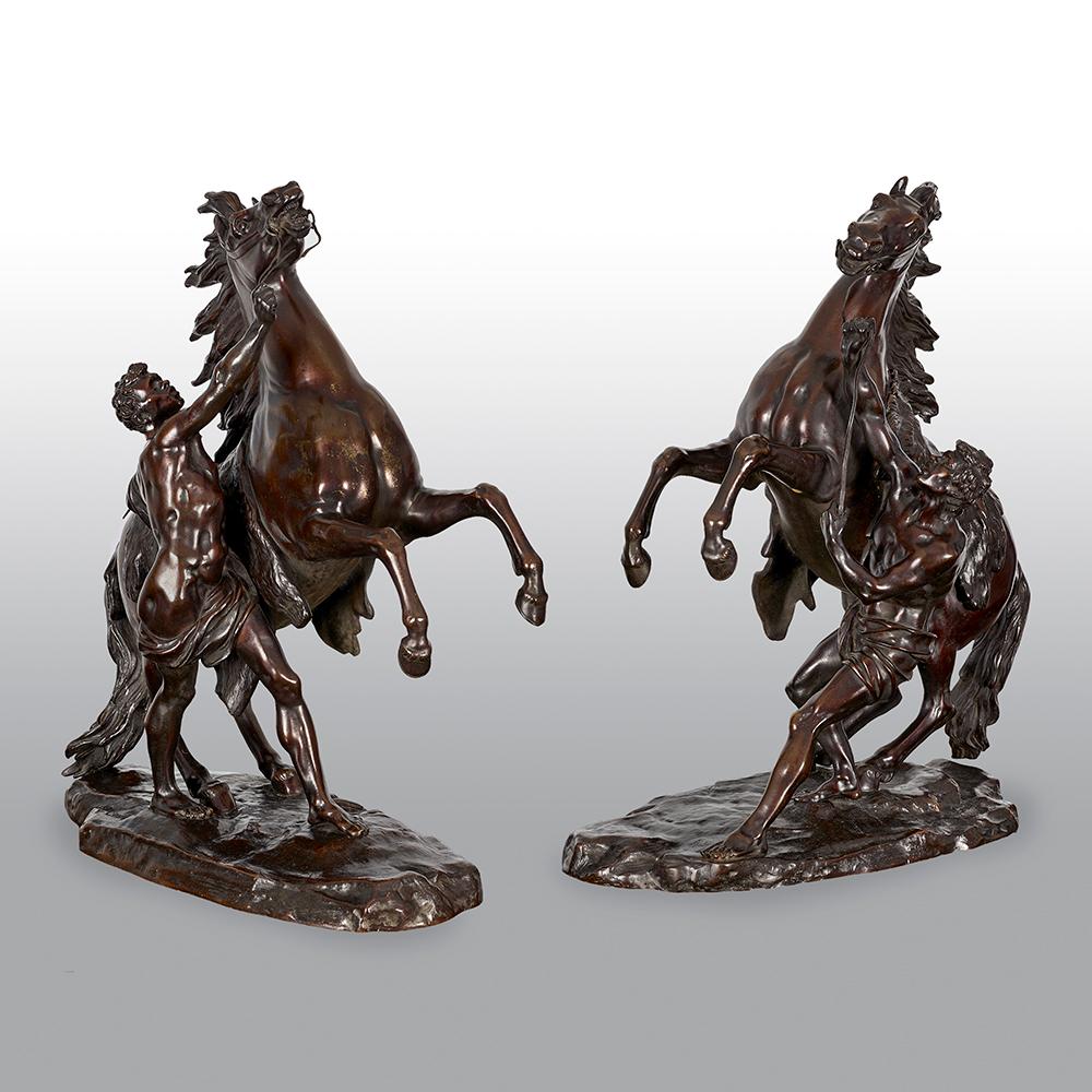 A fine large pair of French Marley horses after Guillaume Coustou the elder 1677-1746. This pair are finely cast and carry great patination.