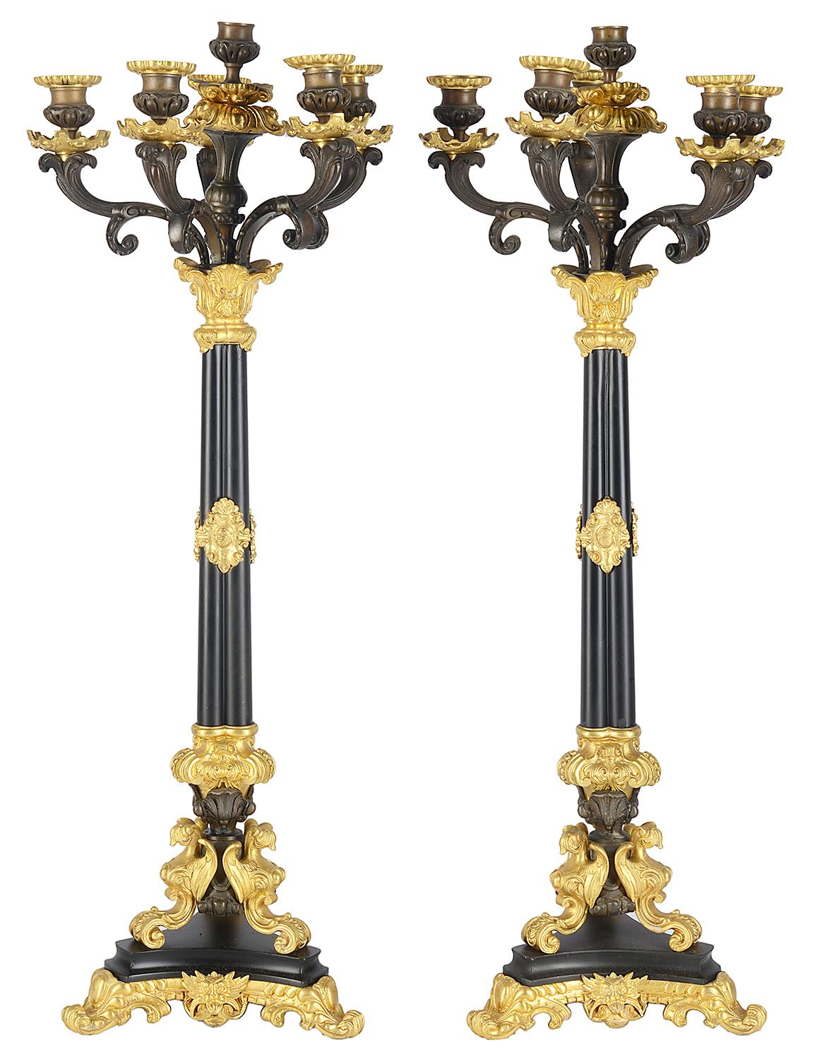 A good quality pair of large 19th century French gilded ormolu and bronze seven branch candelabra.