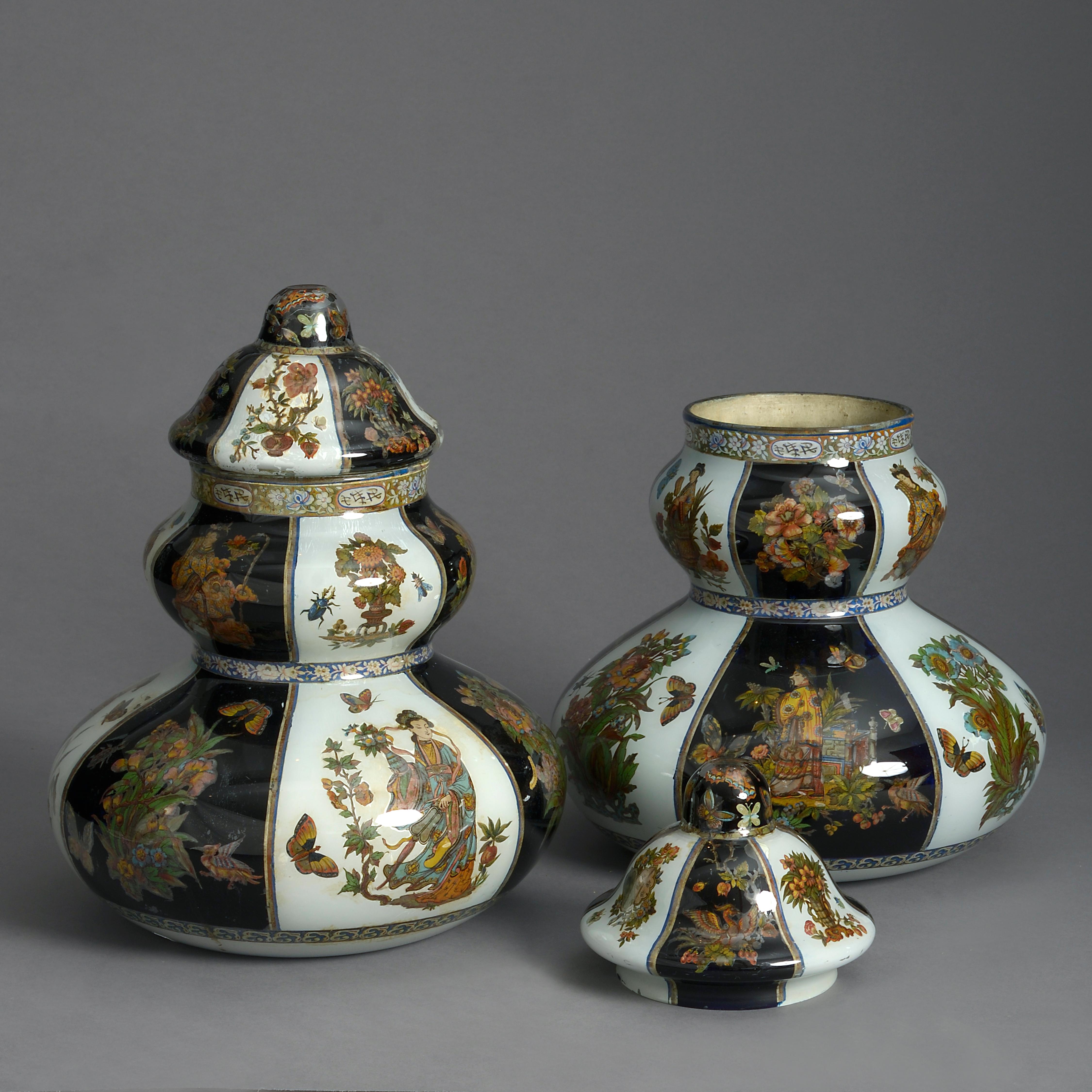 A fine and most unusual 19th century pair of gourd shaped lidded glass decalcomania vases, internally decorated with hand-colored chinoiseries upon a striped blue and white ground.