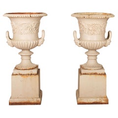 Large Pair of 19th Century English Cast Iron Campana Urns on Plinths