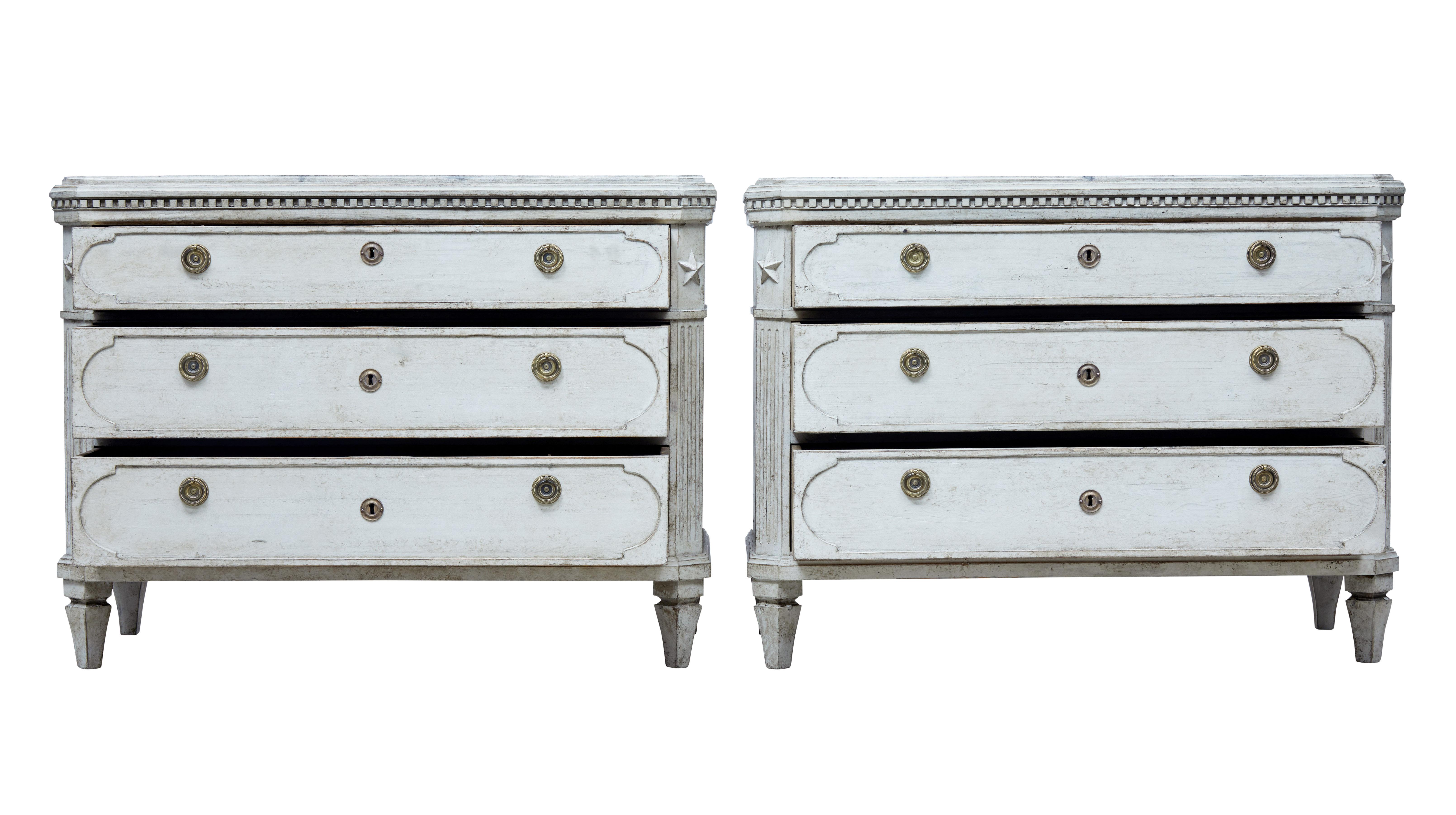 Fine pair of 19th century Swedish oak chest of drawers, circa 1870.

Faux marble hand painted top surface, dentil frieze below the top surface, 3 drawers with detailed fronts, ring handles and escutcheons. Canted corners with star motif.

Oak