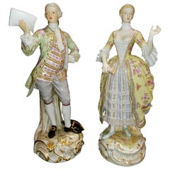 Paire de grandes figurines en porcelaine de Meissen du 19ème siècle représentant des amants chantant