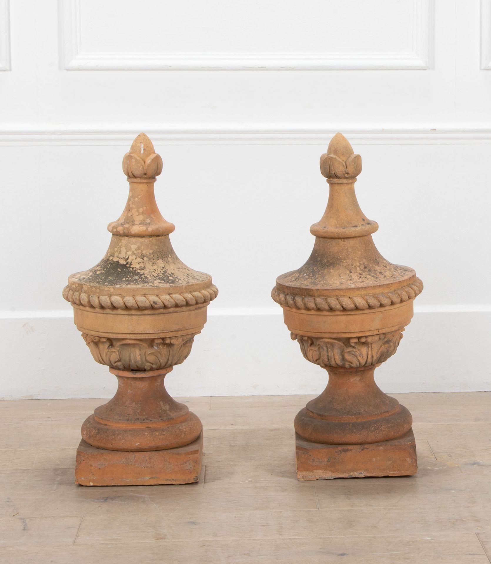 A wonderful pair of large 19th Century English buff terracotta gatepost finials.
Not stamped but most probably by Doulton or Stiff and Son.
With leaf finial, rope twist border and bold acanthus decoration.
Both in very good condition.
Circa 1860.