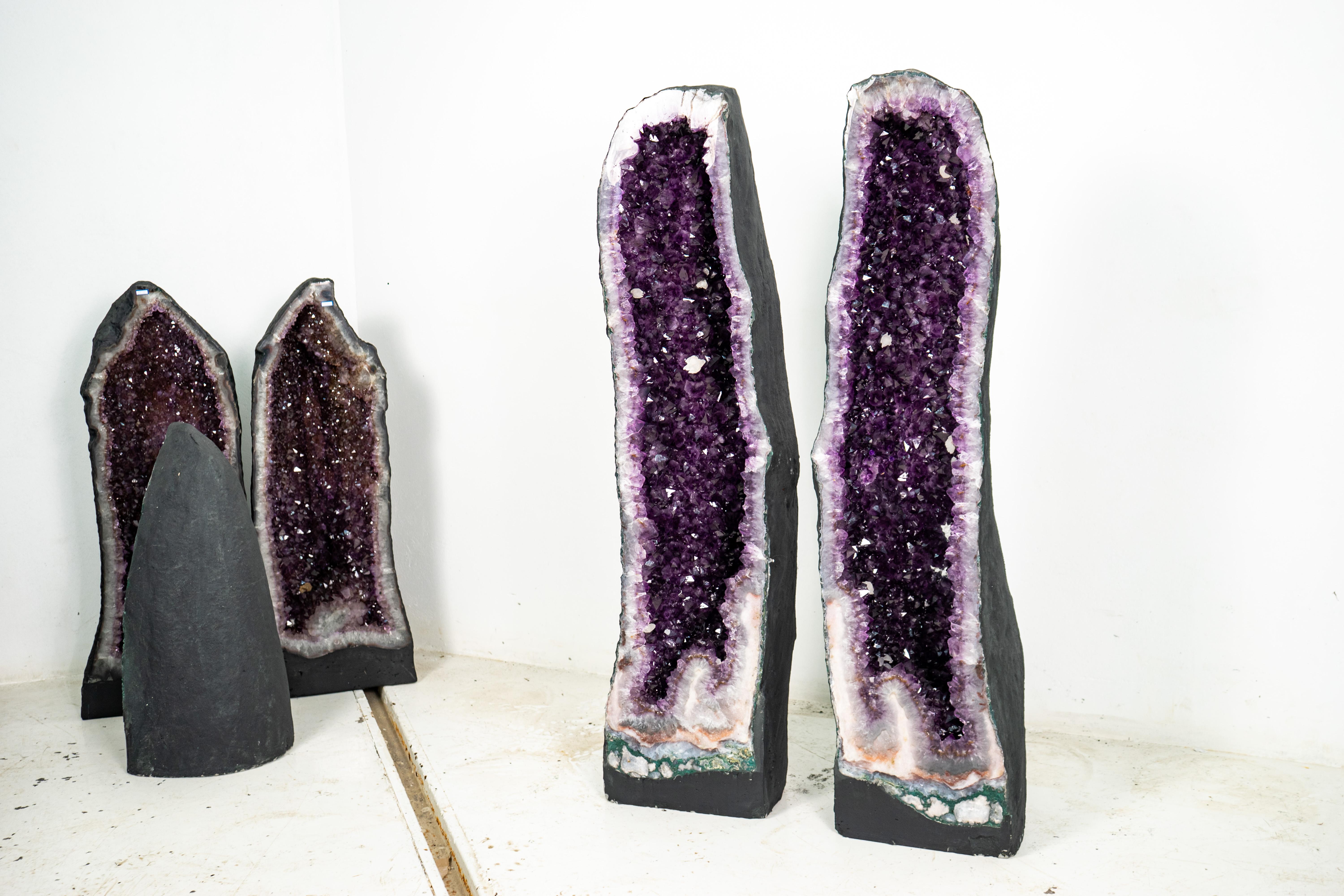 Stunning Pair of Tall Amethyst Cathedral Geodes – Rich Violet-Purple Crystals & Premium Druzy Formation

▫️ Description

This book-matching pair of Amethyst cathedral geodes ranks among the finest natural Amethyst specimens available, highly prized