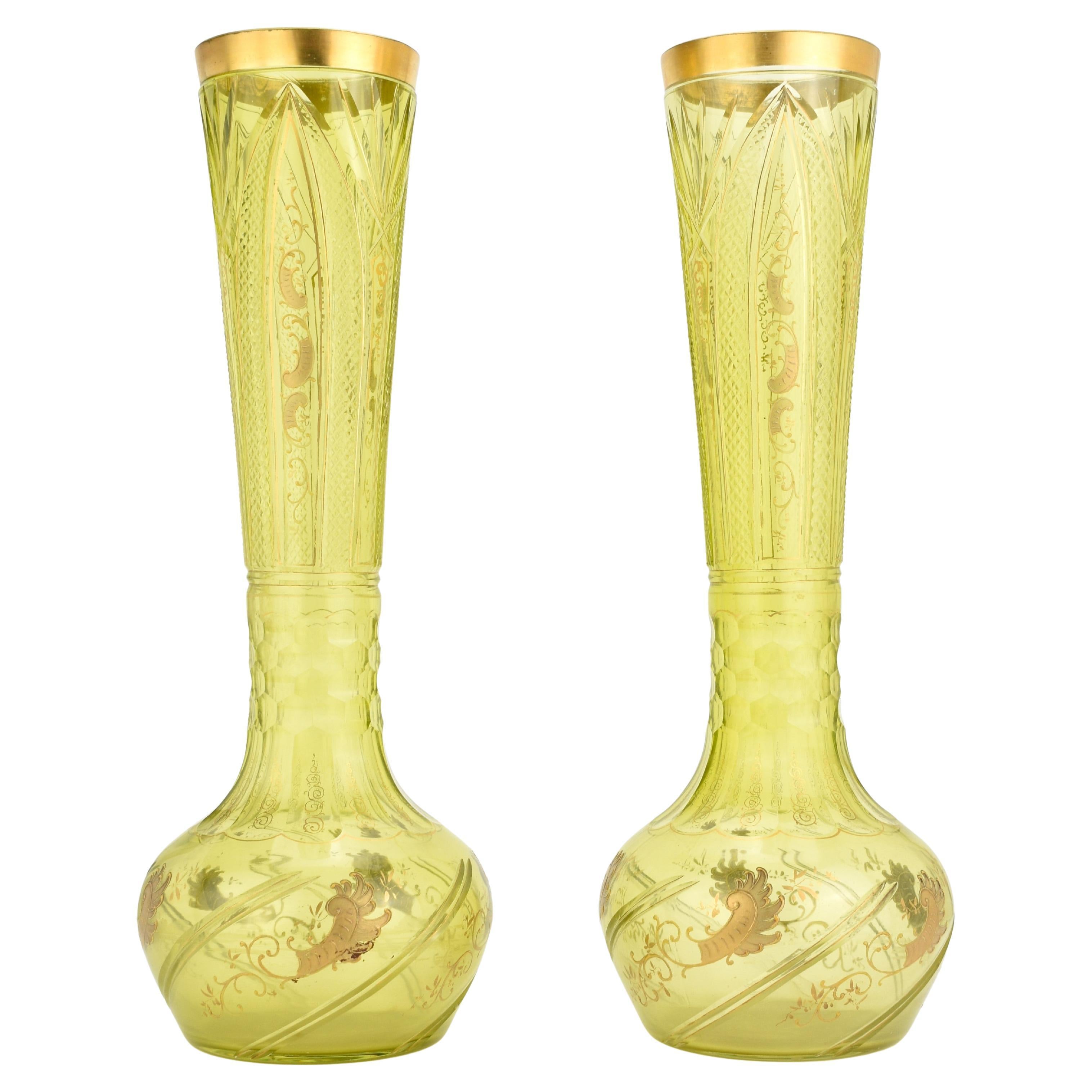 A very rare and impressive pair of late 19th-century Bohemian cut crystal uranium-colored vases, showcasing exceptional craftsmanship and design. These vases are crafted from the highest quality Bohemian hand-diamond-cut crystal, distinguished by