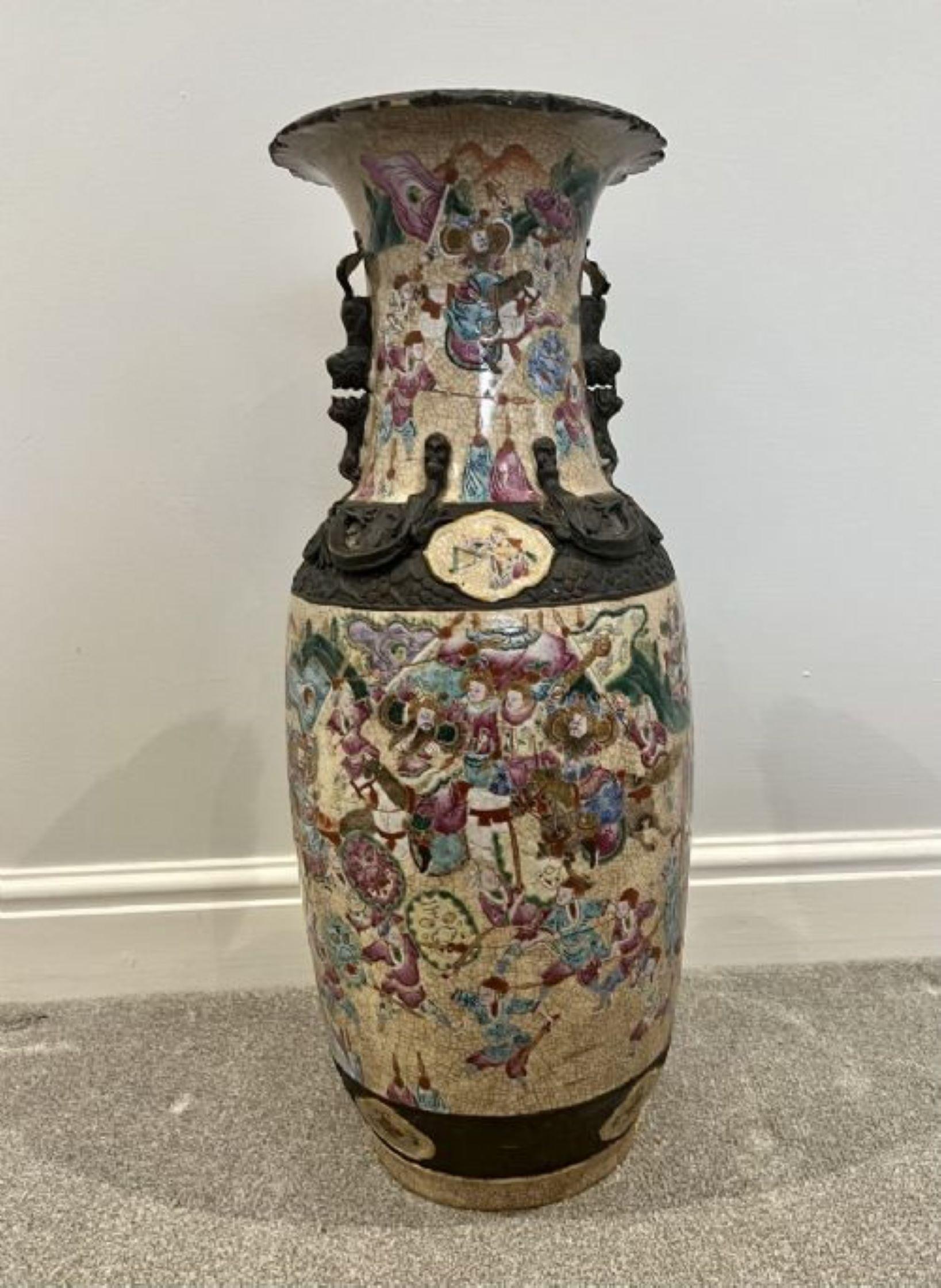 Large pair of antique Chinese crackled glazed vases decorated in wonderful red, green, blue, yellow and brown coloured enamels depicting warring scenes. Our restoration to the top as shown