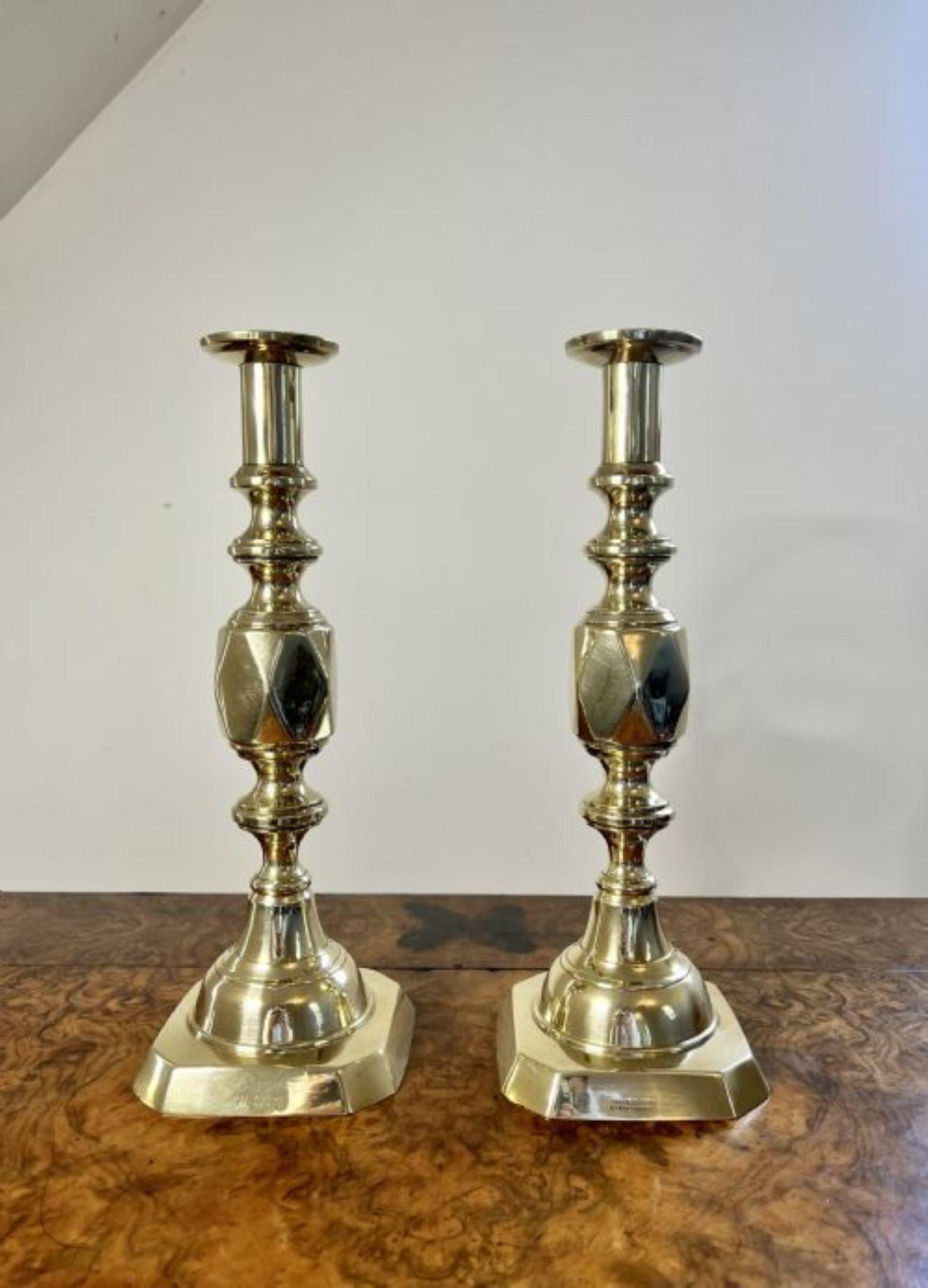Large pair of antique Victorian quality brass ace of diamonds candlesticks having a quality pair of large antique Victorian brass candlesticks with 'THE ACE OF DIAMONDS' stamped to the front edge.
