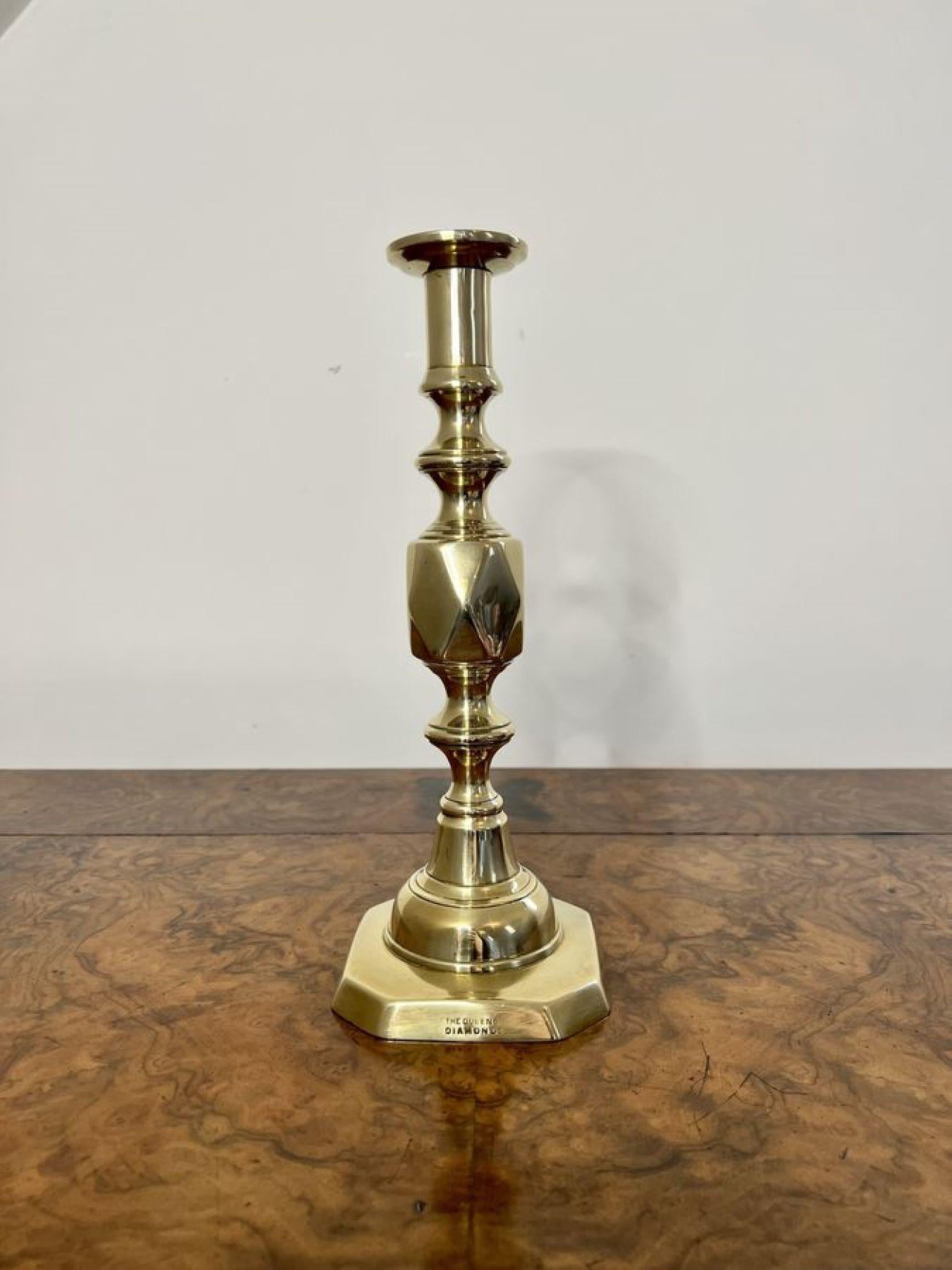 Large pair of antique Victorian quality brass candlesticks marked to the base the Queen of diamonds.

D. 1890 
