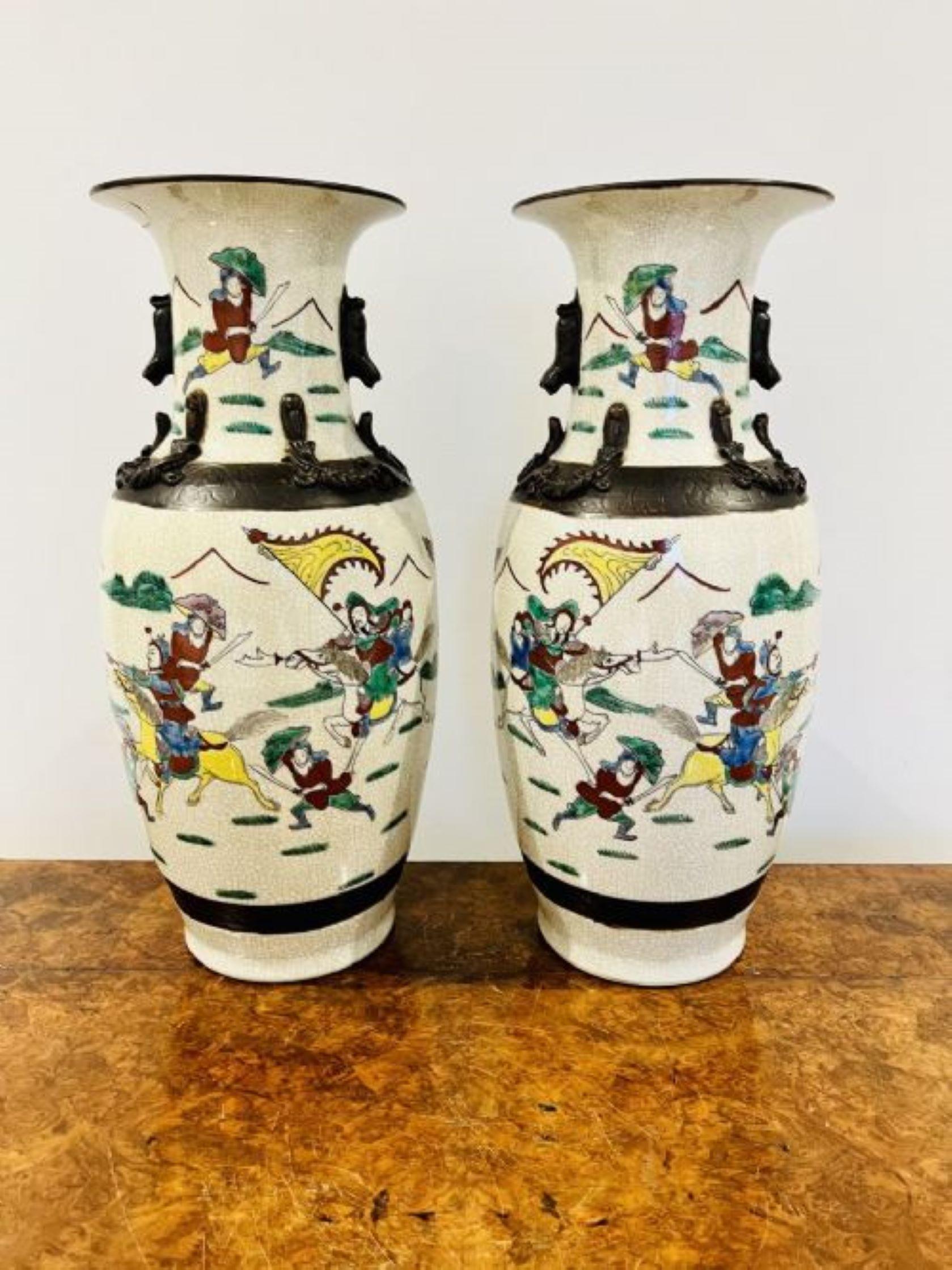 Large pair of antique Victorian quality Chinese cracked glazed vases decorated in wonderful red, blue, green, yellow, brown and white enamels depicting warring scenes small restoration on one of the vases as shown 