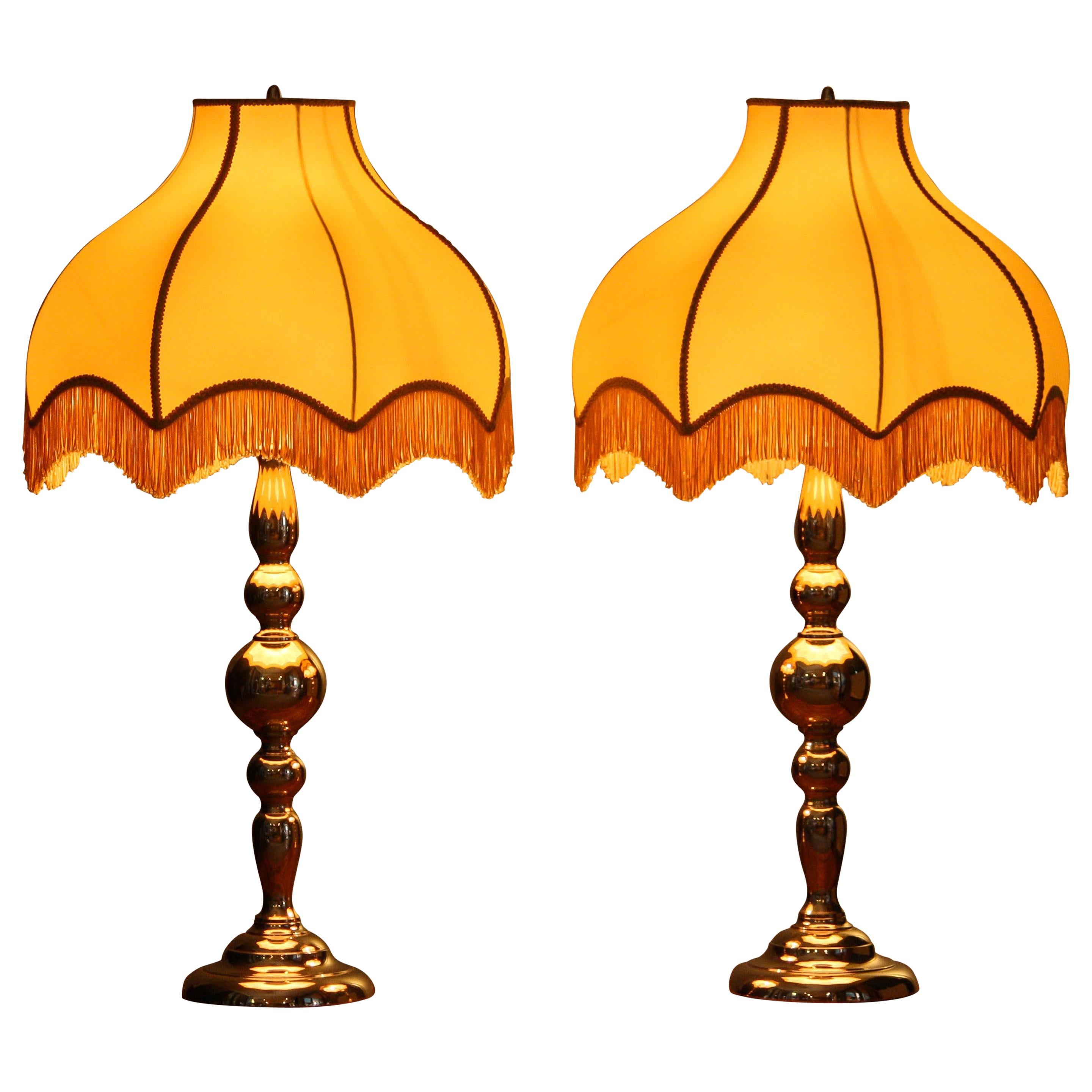 Beautiful and extra-large set of two brass table lamps with silk shades by Rejmyre, Sweden.
Both lamps are in very good condition.
Technically 100% and suitable for 230 and 110 volts. (Bulb size E28 / E27).