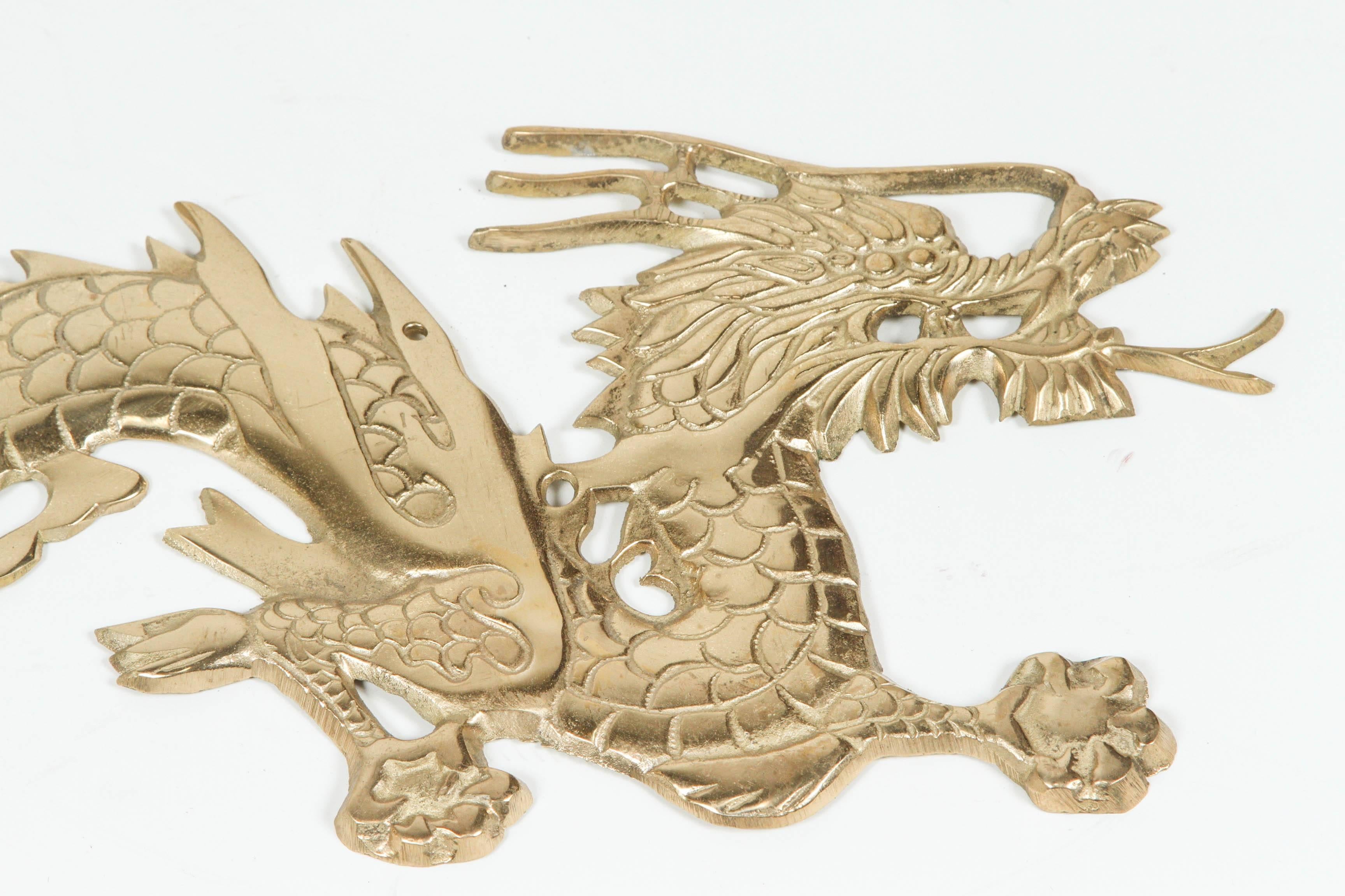 Chinoiserie Large Pair of Asian Cast Brass Dragons Chasing a Ball Wall Mount