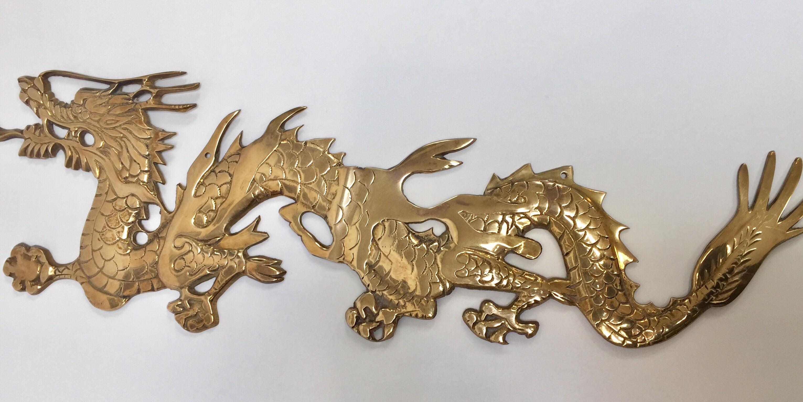 20th Century Large Pair of Asian Cast Brass Dragons Chasing a Ball Wall Mount