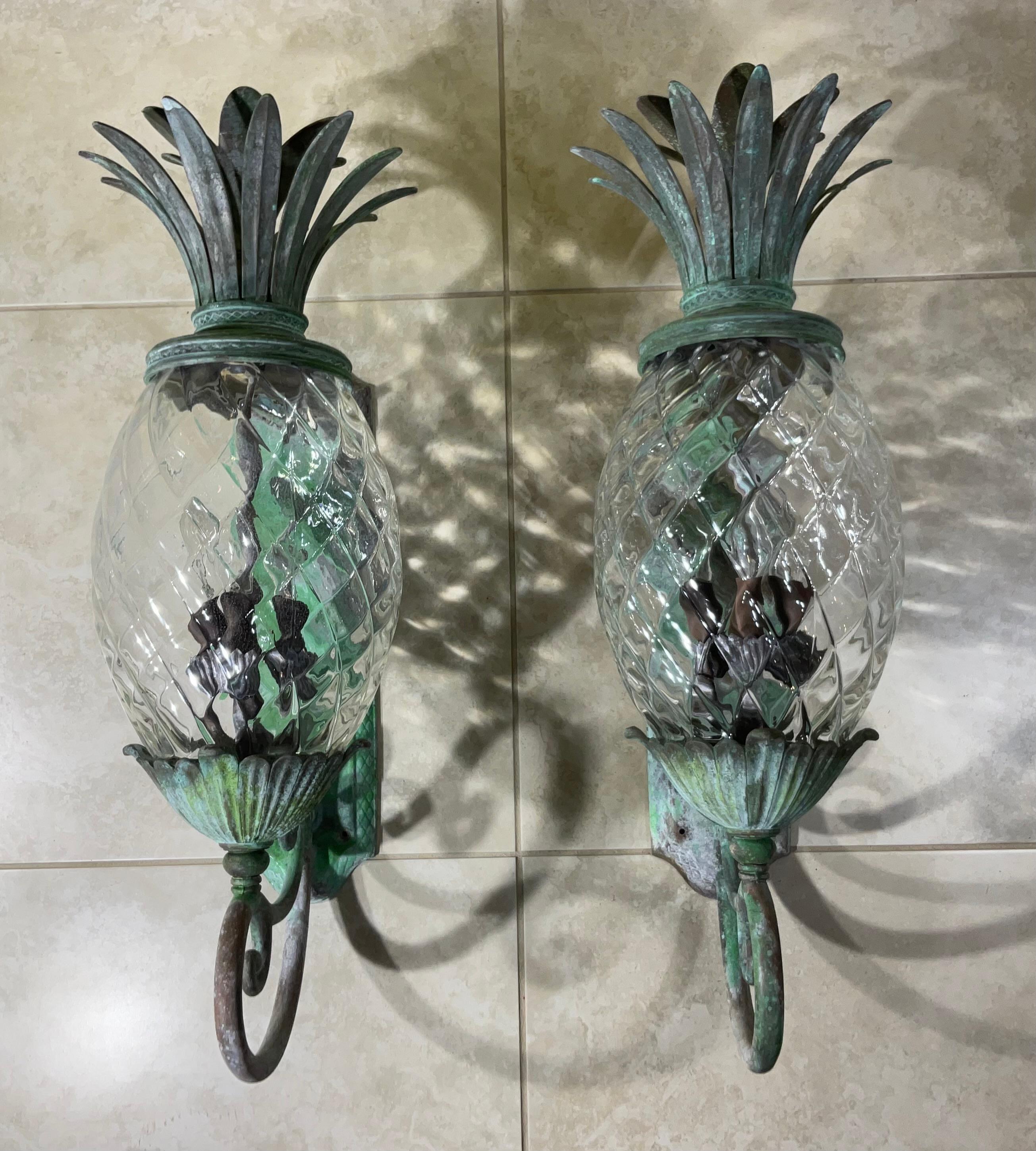 Beautiful pair of pineapple wall lights, made of bronze and solid brass with three 60/watt light each , great patina , decorative for indoor or outdoor.
Ready you use .
