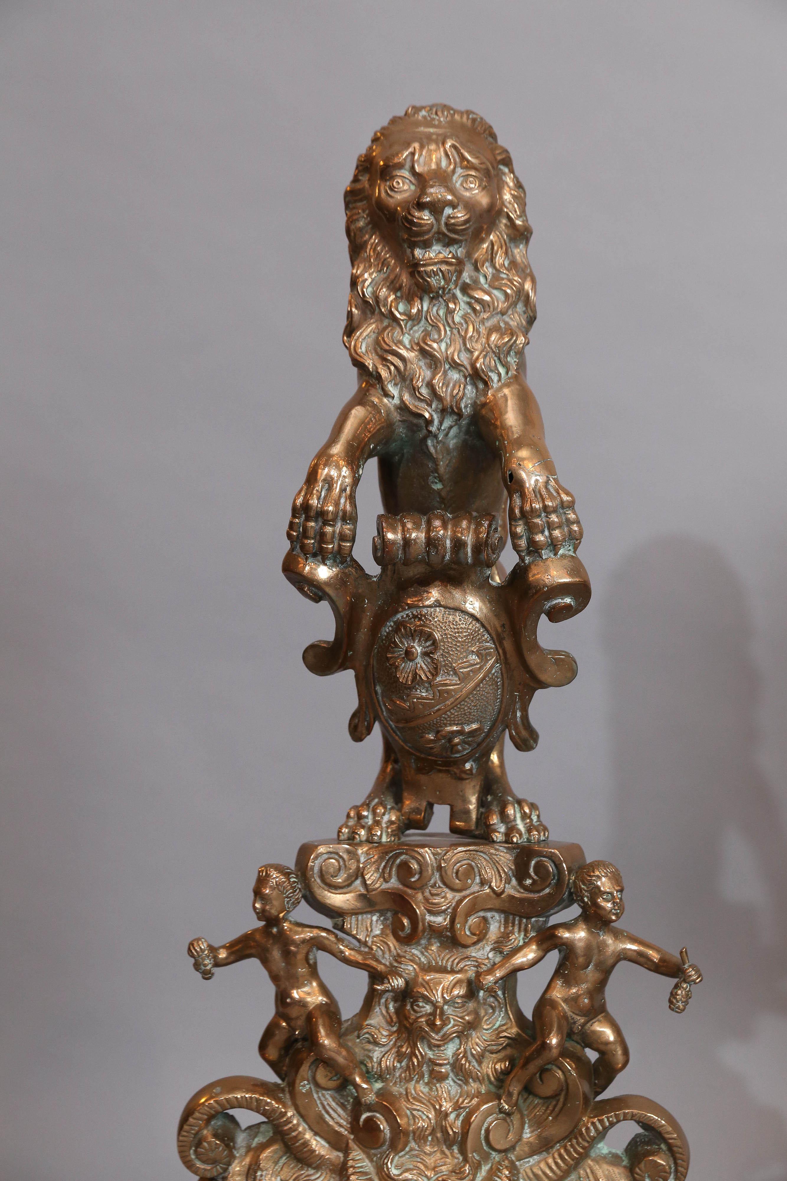 Cast Large Pair of Bronze Rococo Andirons with Standing Lions For Sale