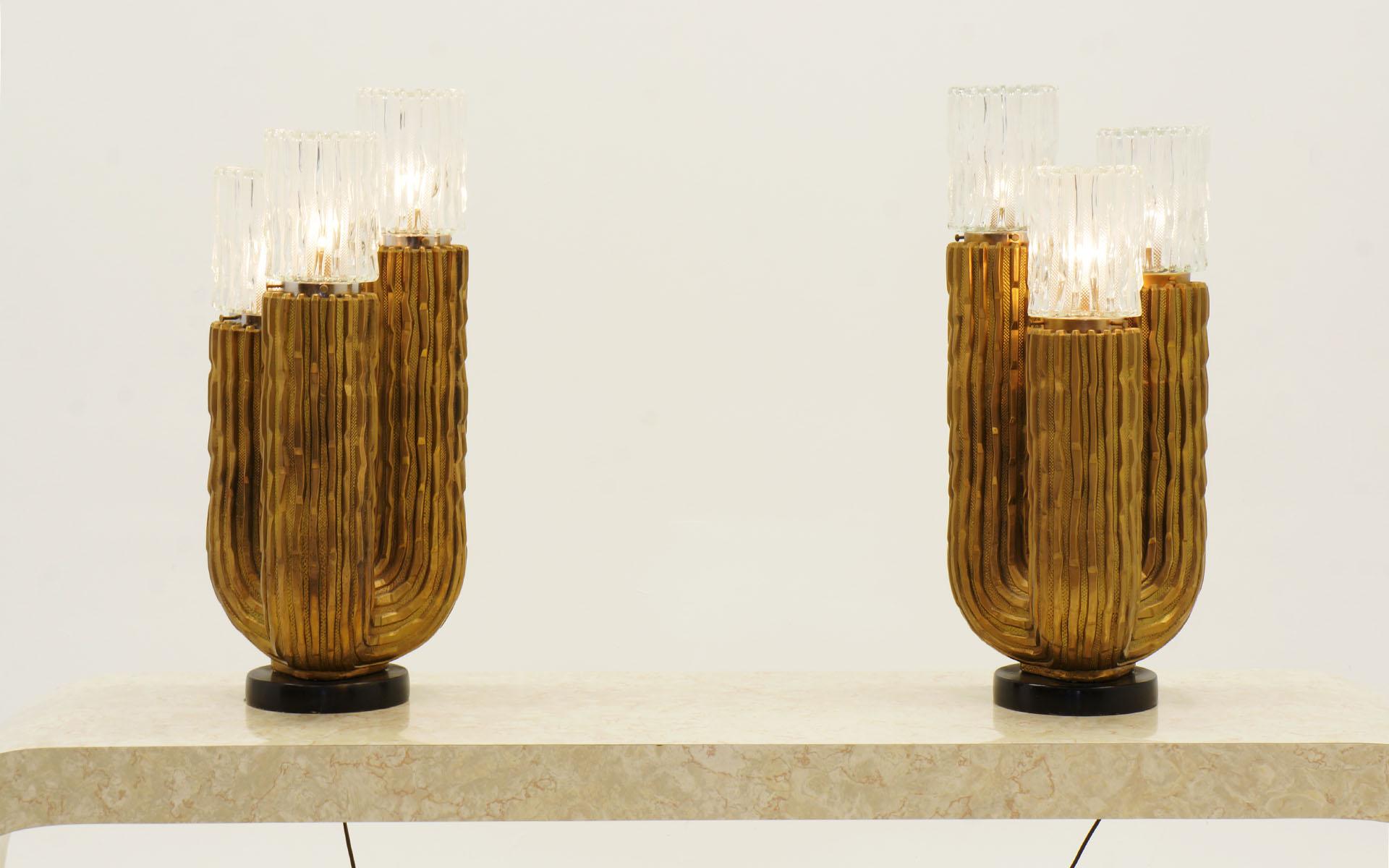 Pair of cactus lamps by Fuggiti Studios. The lamps feature three glass shades and bodies made of plaster with gold leaf. The glass shades are the same design and texture as the bases. A unique and striking set.