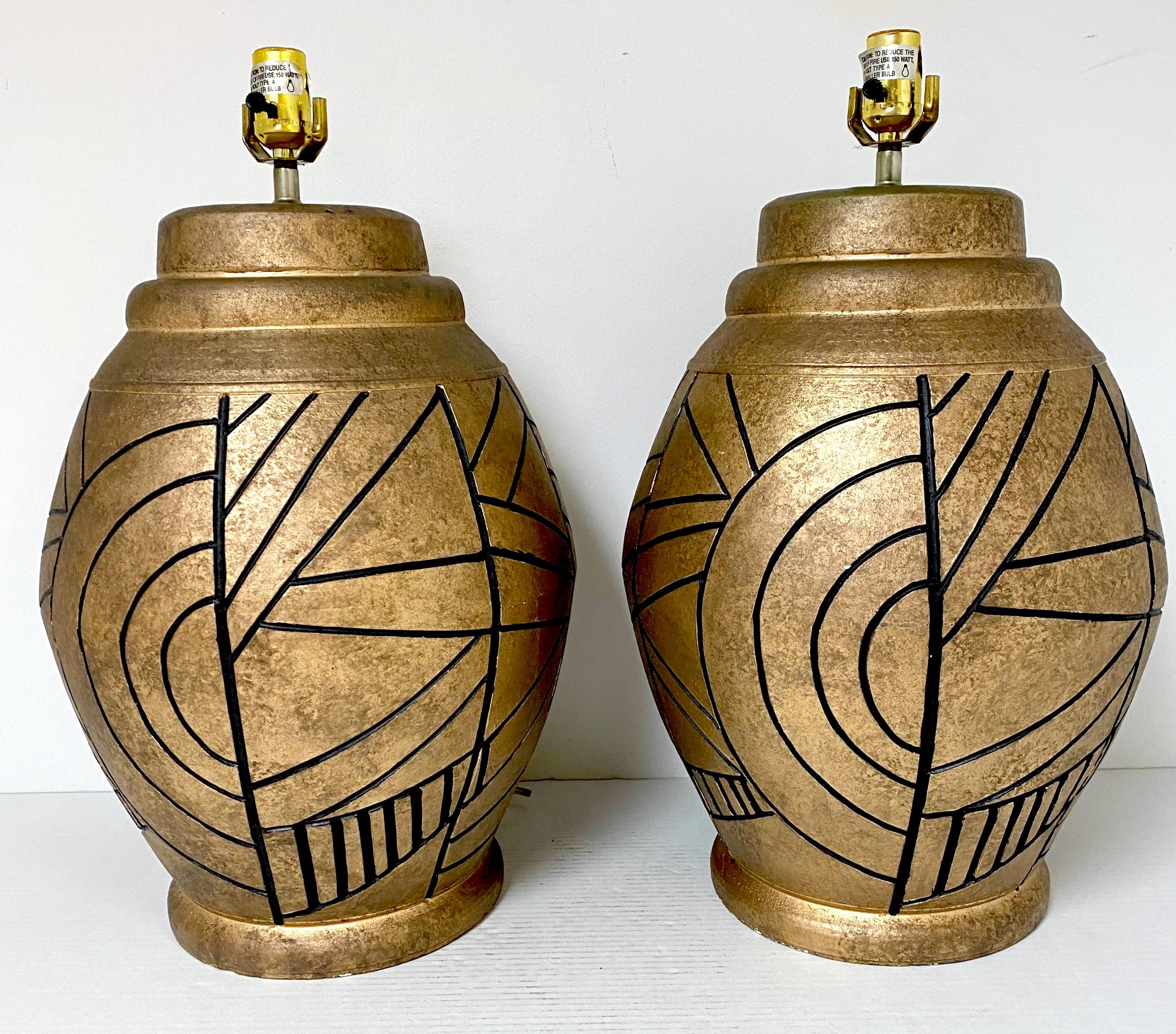 Large Pair of California Studios Earth Tone & Abstract Black Engraved Decoration

A Large Pair of California Studios Earth Tone & Abstract Black Engraved Decoration lamps. Each lamp boasts substantial size and scale, standing at 22 inches high to
