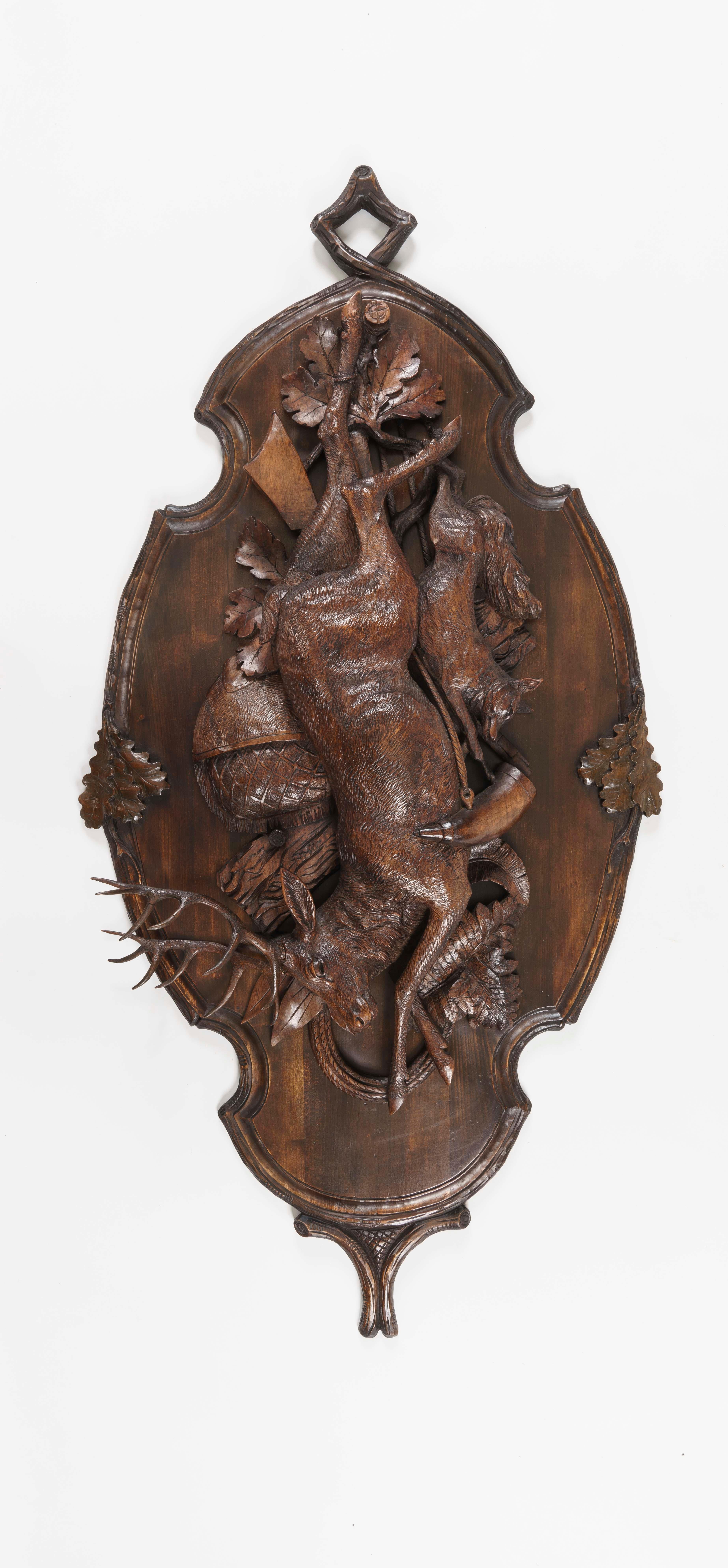 A pair of large black forest game plaques

Expertly carved in lindenwood, the shaped plaques, carved with oak leaves, depict a buck and a roe deer, a hare and fox, hung as trophies.
Brienz area, Switzerland, circa 1880


Brienz, Bernese