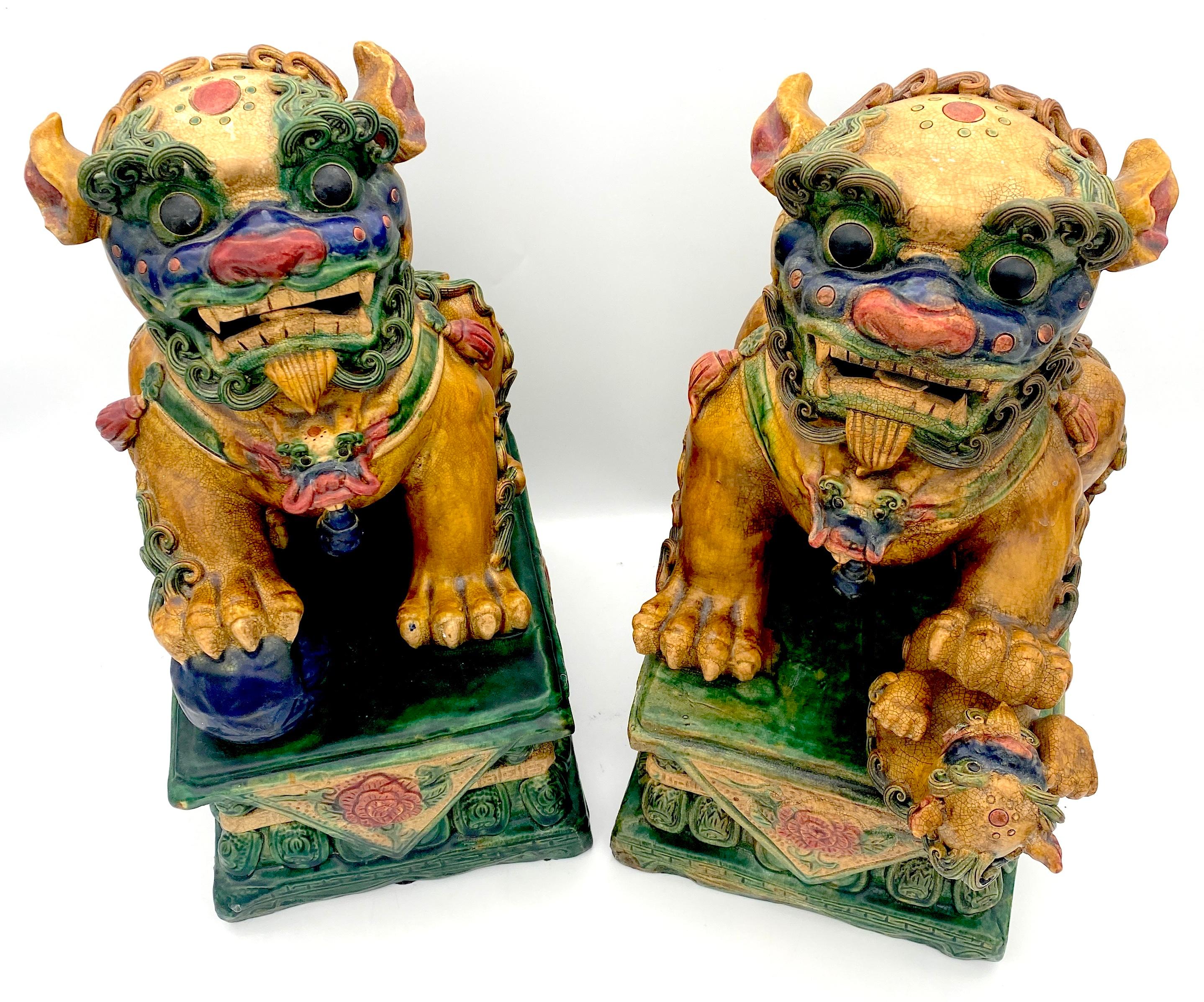 Large Pair of Chinese Export Sancai Glazed Foo Dogs In Good Condition For Sale In West Palm Beach, FL
