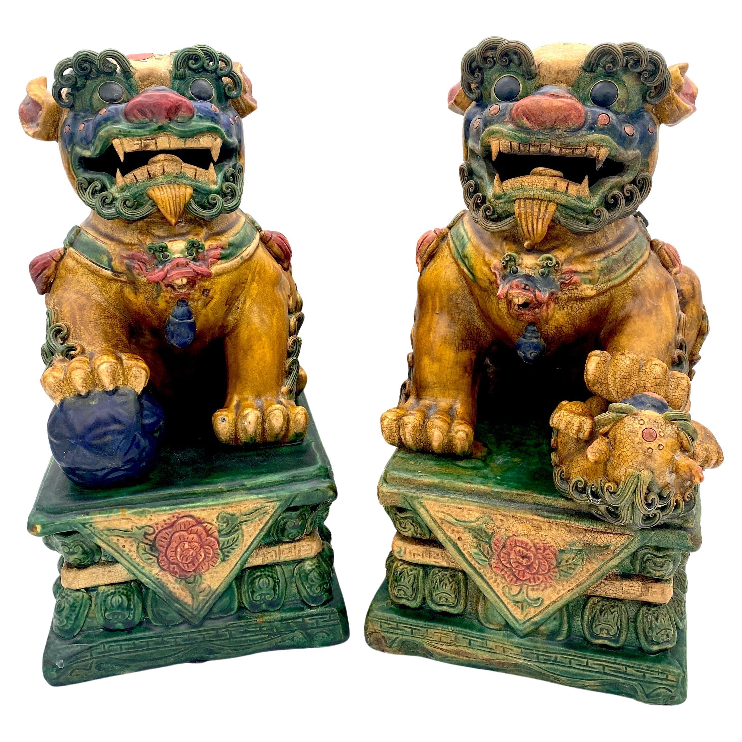 Large Pair of Chinese Export Sancai Glazed Foo Dogs For Sale