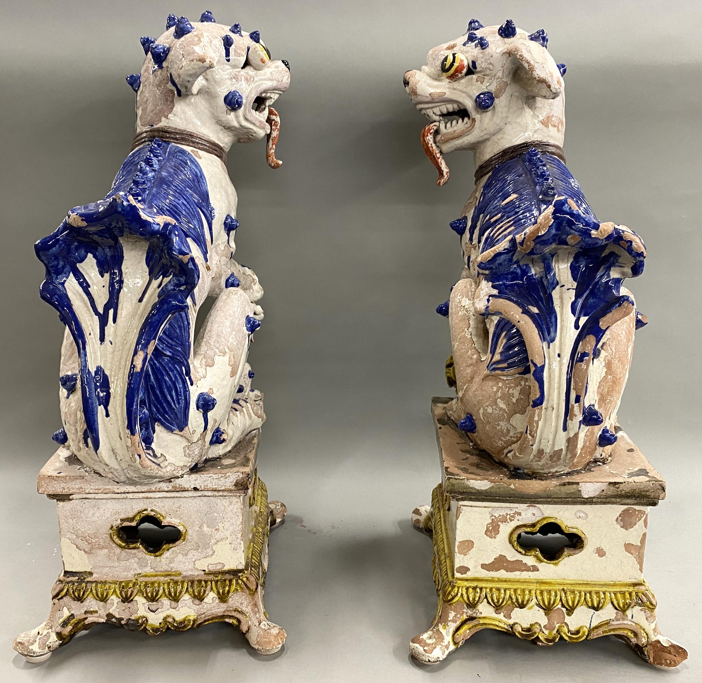 Large Pair of Chinese Tin Glazed Earthenware Foo Dogs with Ball & Pup Under Paws 1