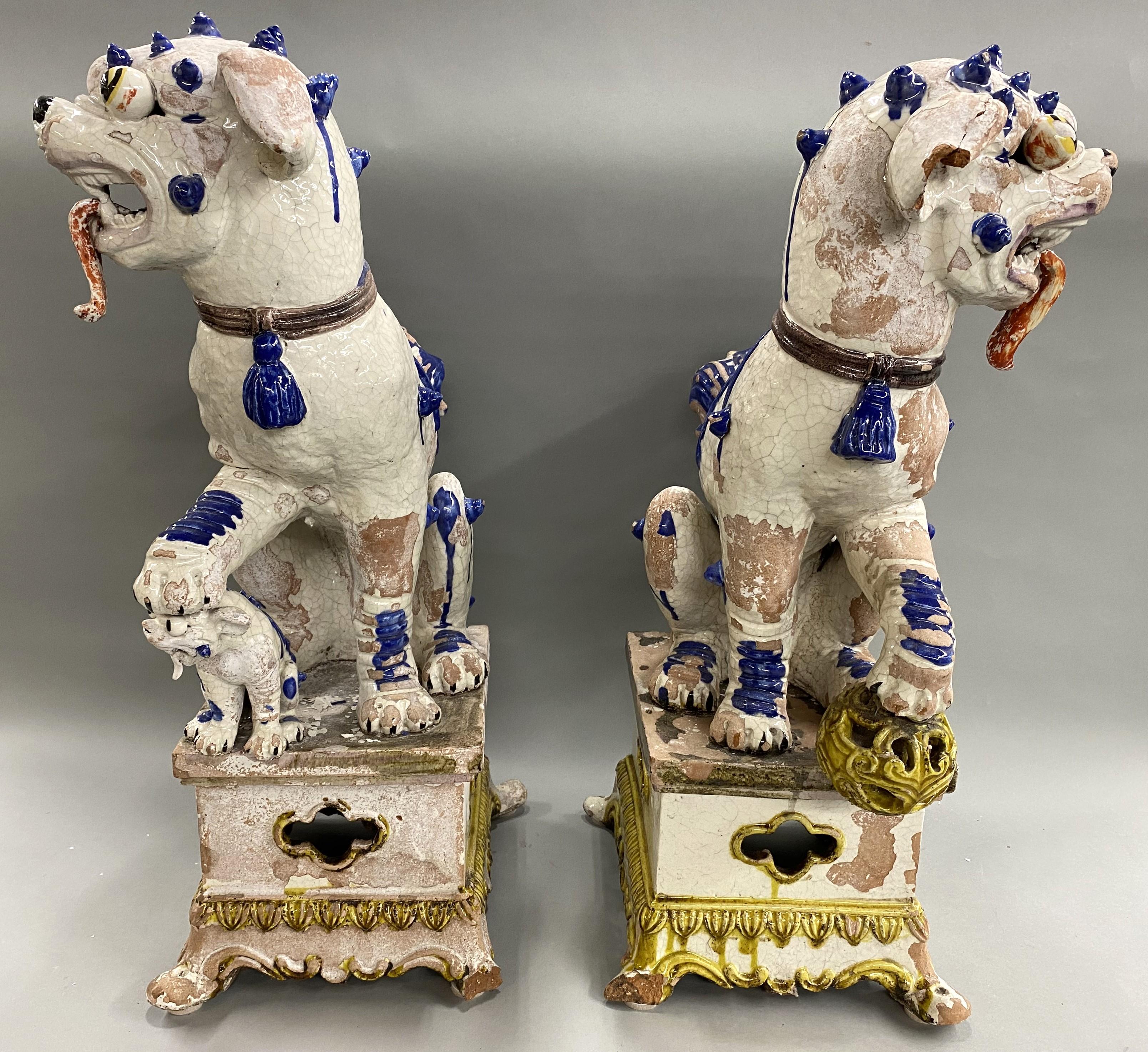 Large Pair of Chinese Tin Glazed Earthenware Foo Dogs with Ball & Pup Under Paws 3
