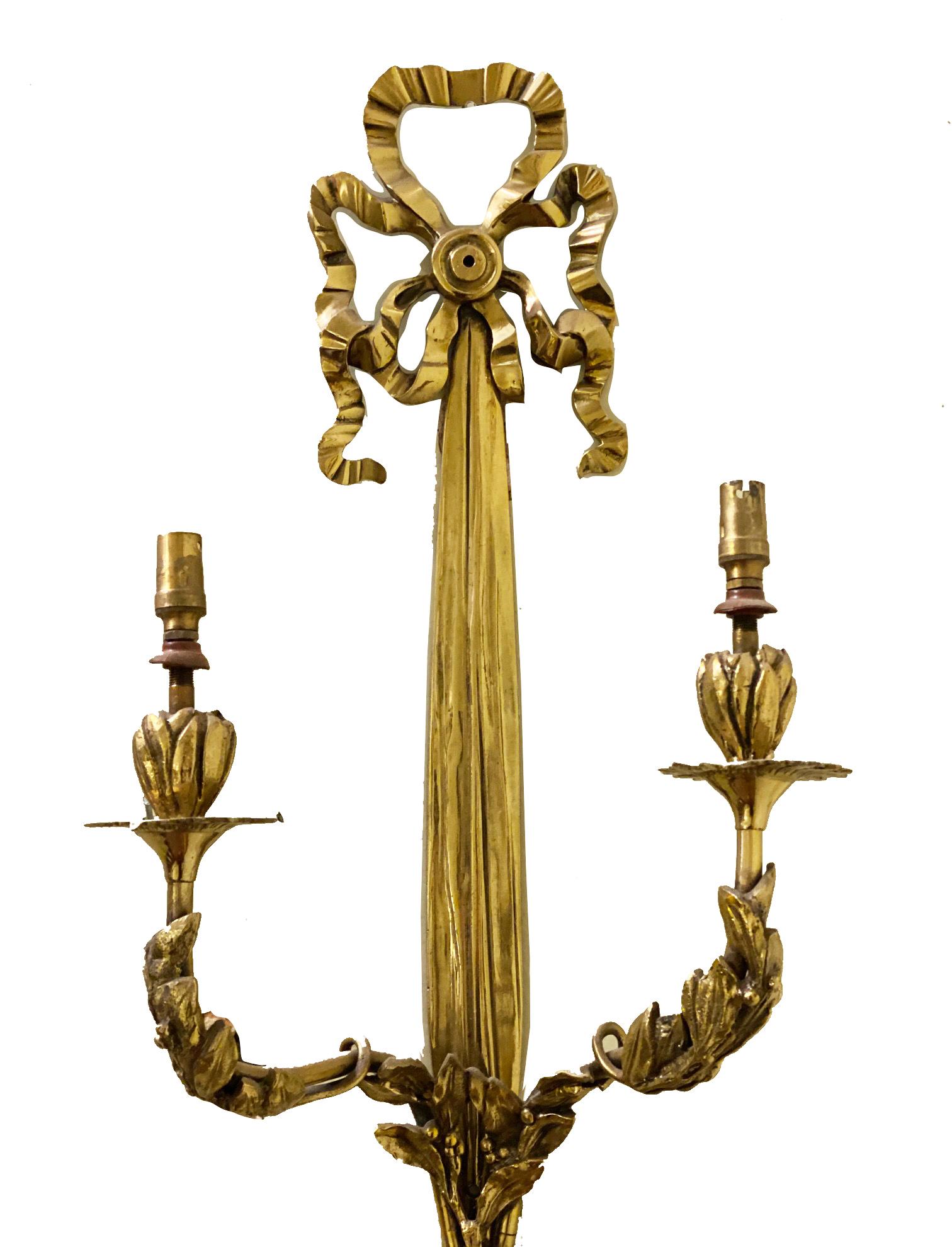 French Large Pair of classical ormolu Louis XVI style two branch wall lights For Sale