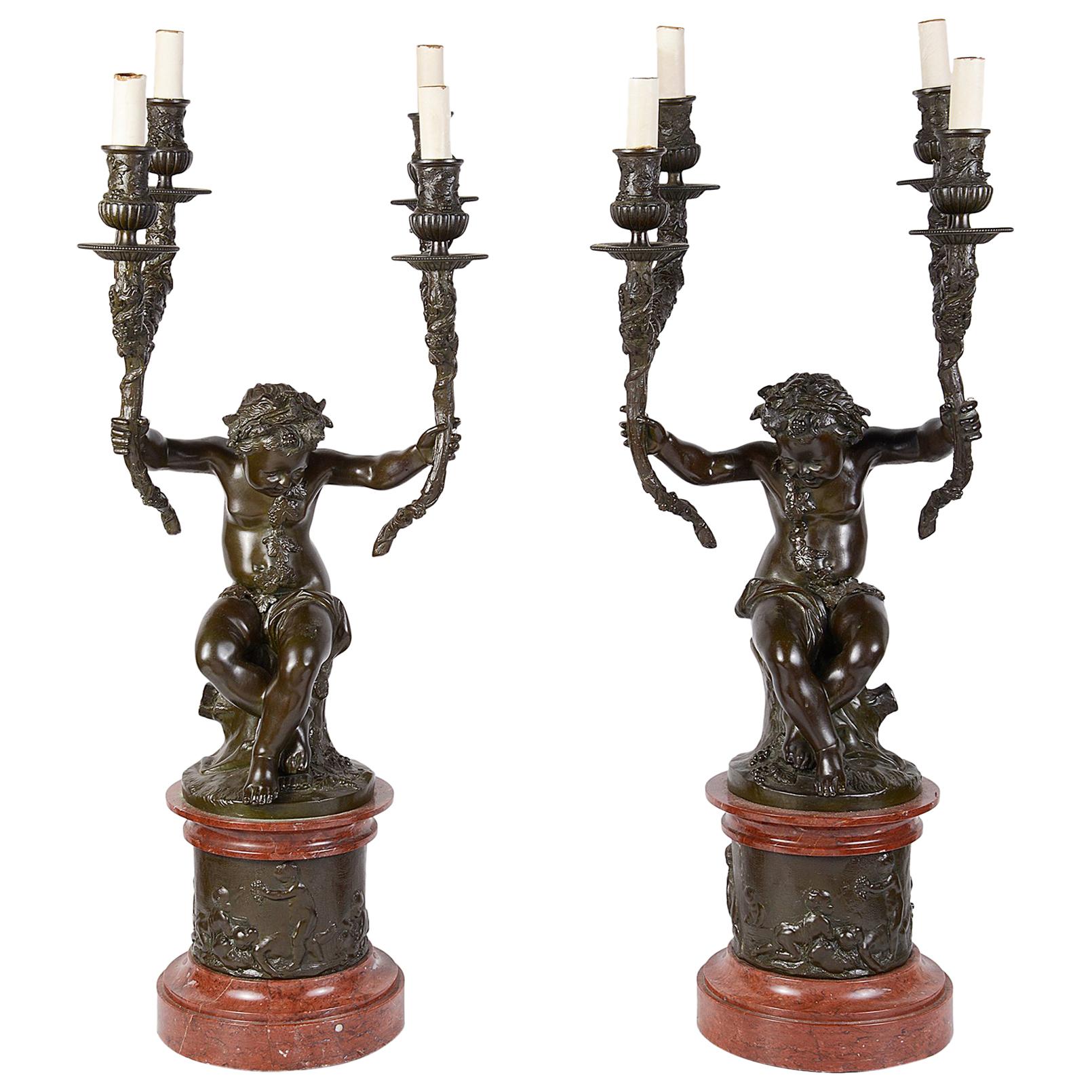 Grande paire de candélabres clodiens en bronze, 19ème siècle