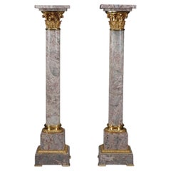 Large Pair of Composite Marble and Gilt Bronze Columns